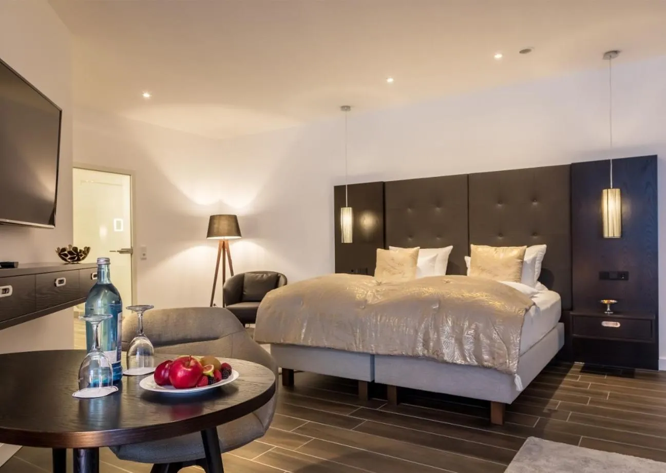 Bed in Romantik Hotel Schwanefeld & Spa