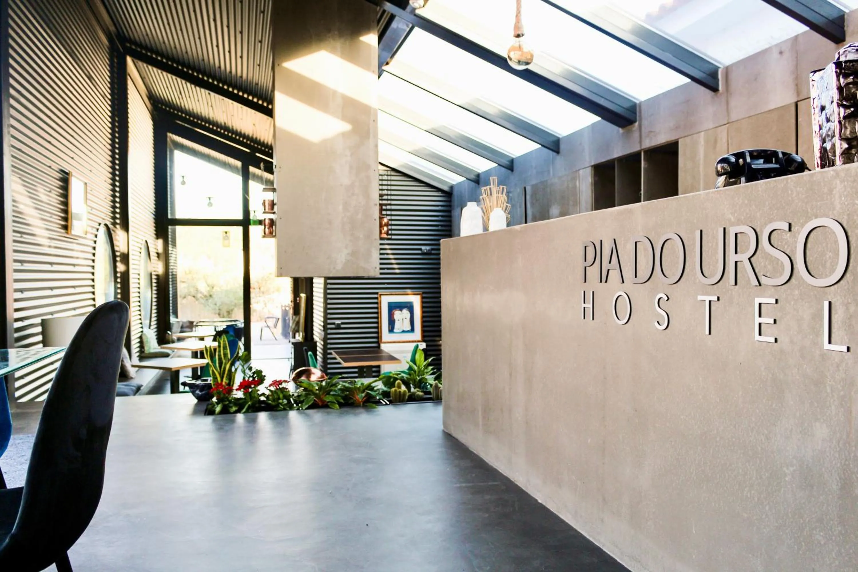 Property logo or sign in Hostel Pia do Urso