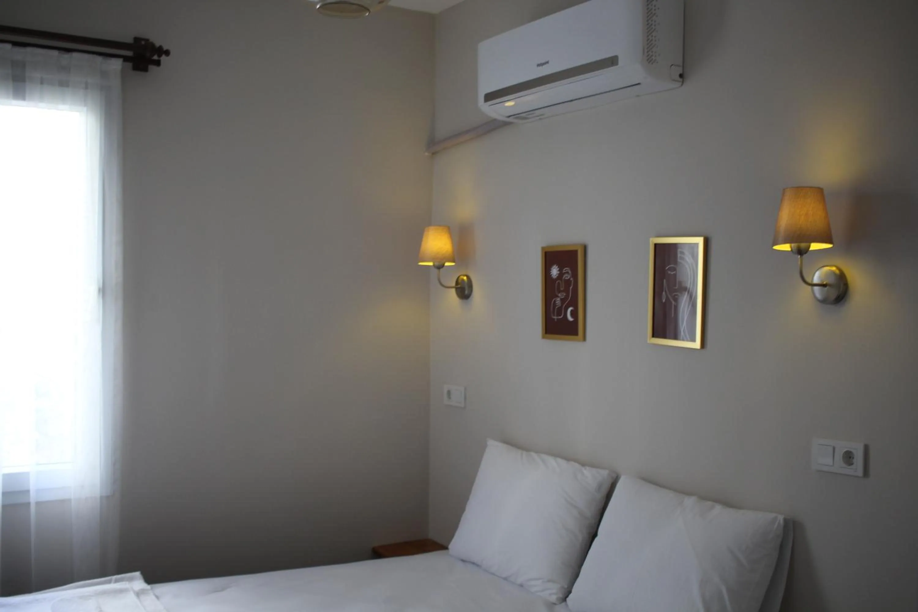 Bed in Holy Pansiyon