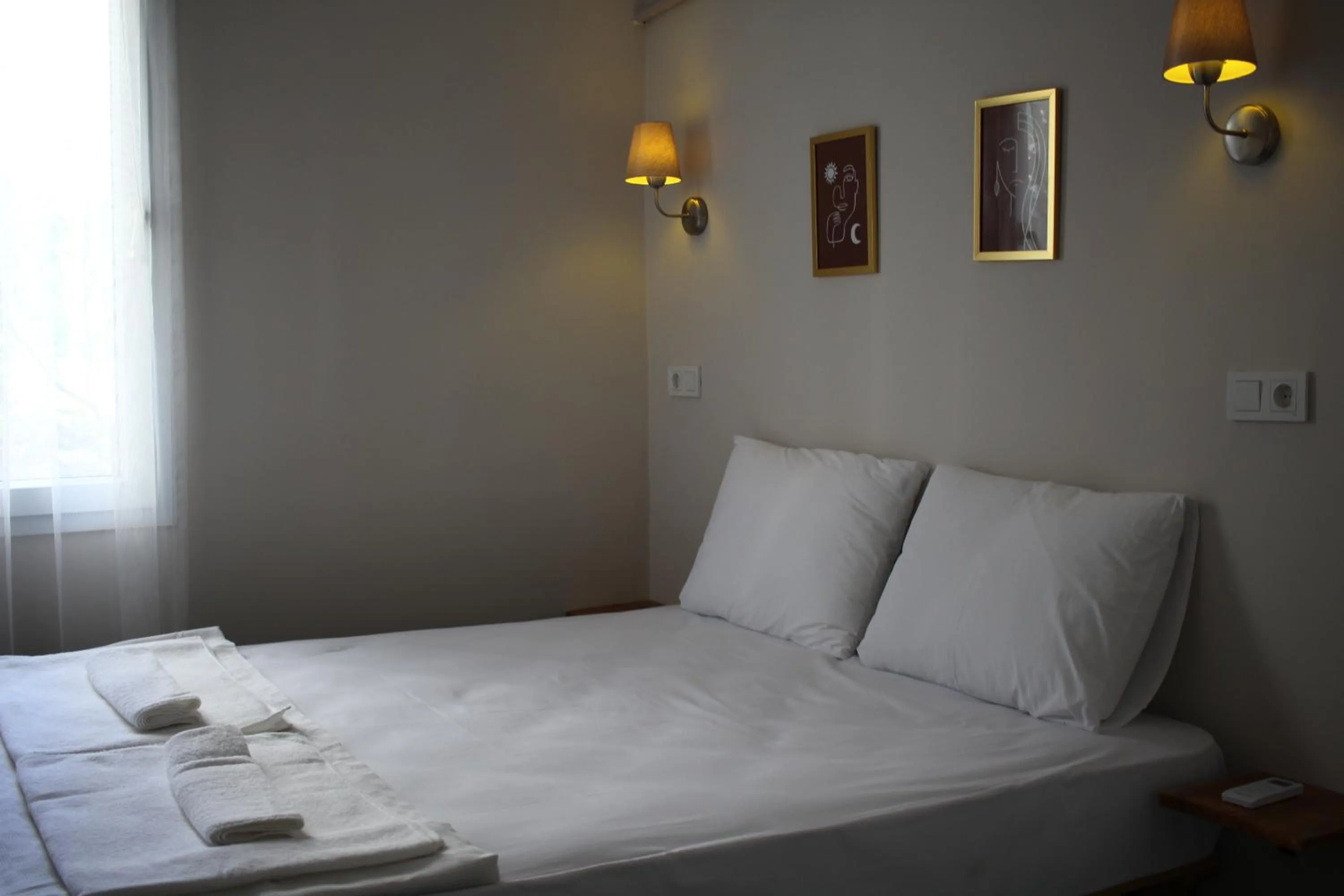 Bed in Holy Pansiyon