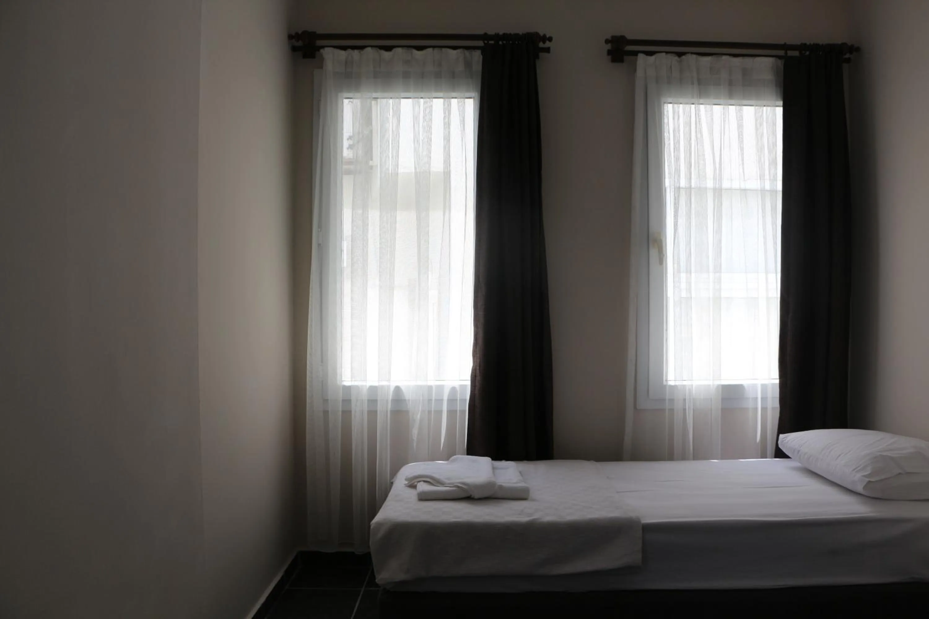 Bed in Holy Pansiyon