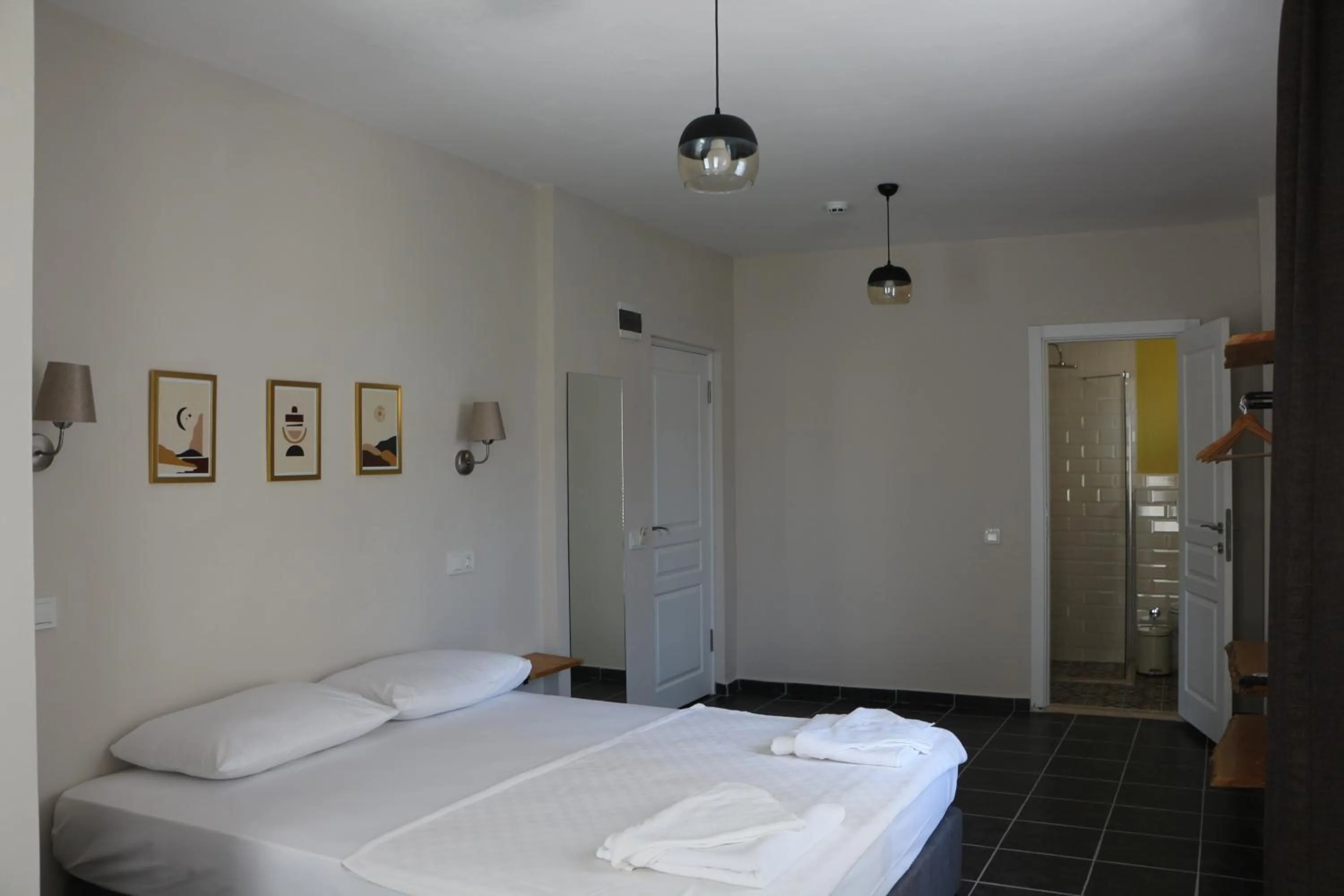 Bed in Holy Pansiyon