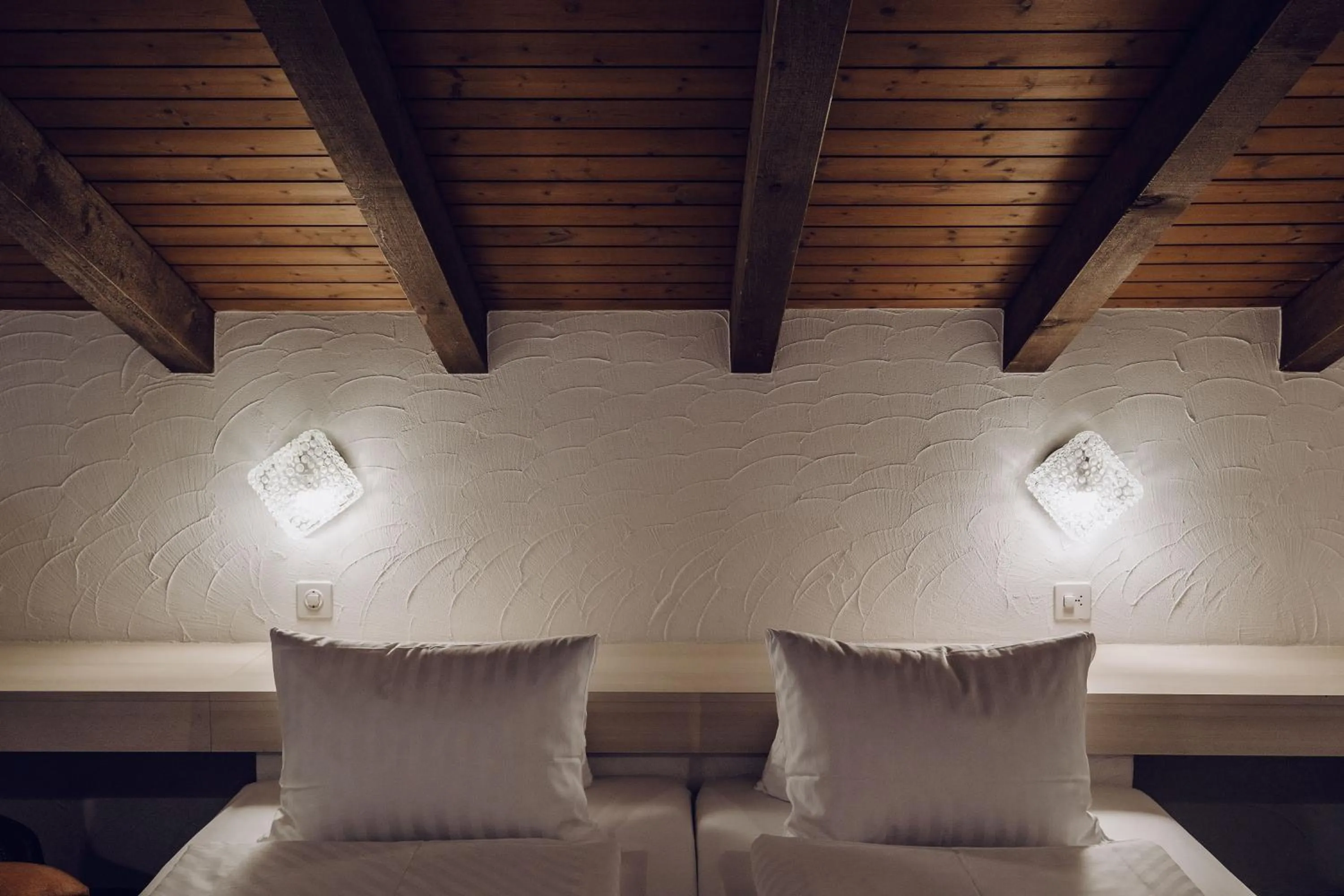 Bed in Hotel Chalet Swiss