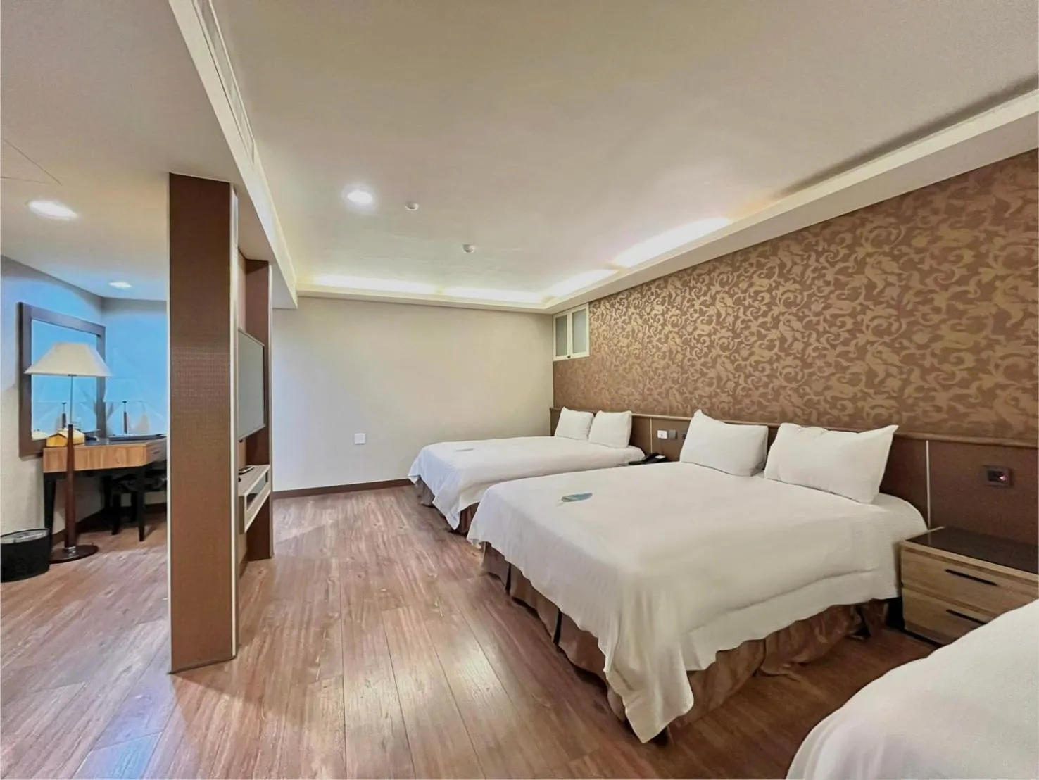 Bed in Grand Earl Hotel