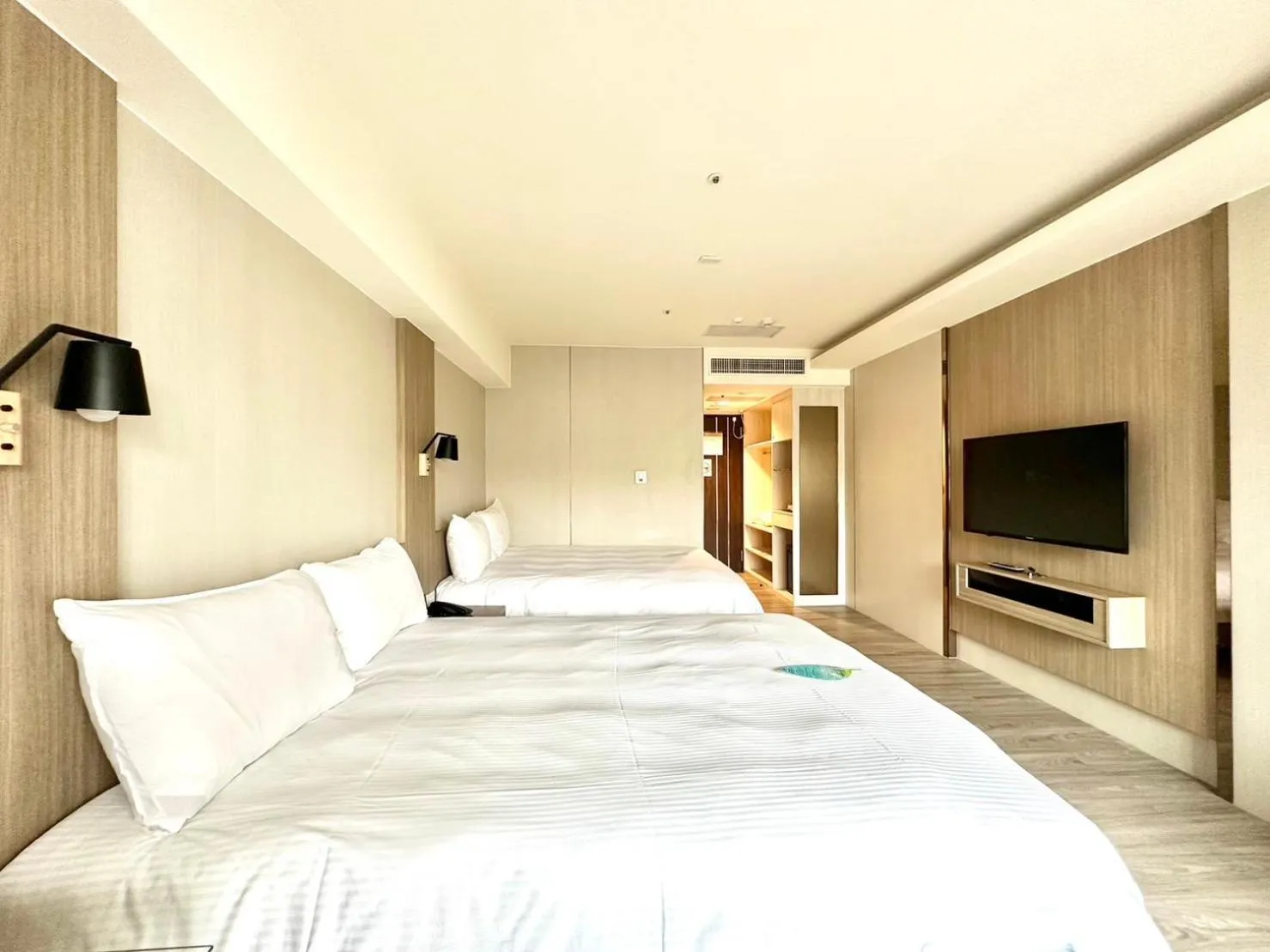 Bed in Grand Earl Hotel