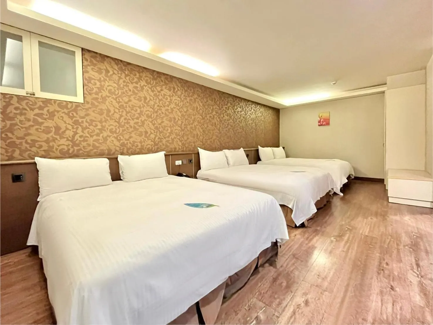 Bed in Grand Earl Hotel