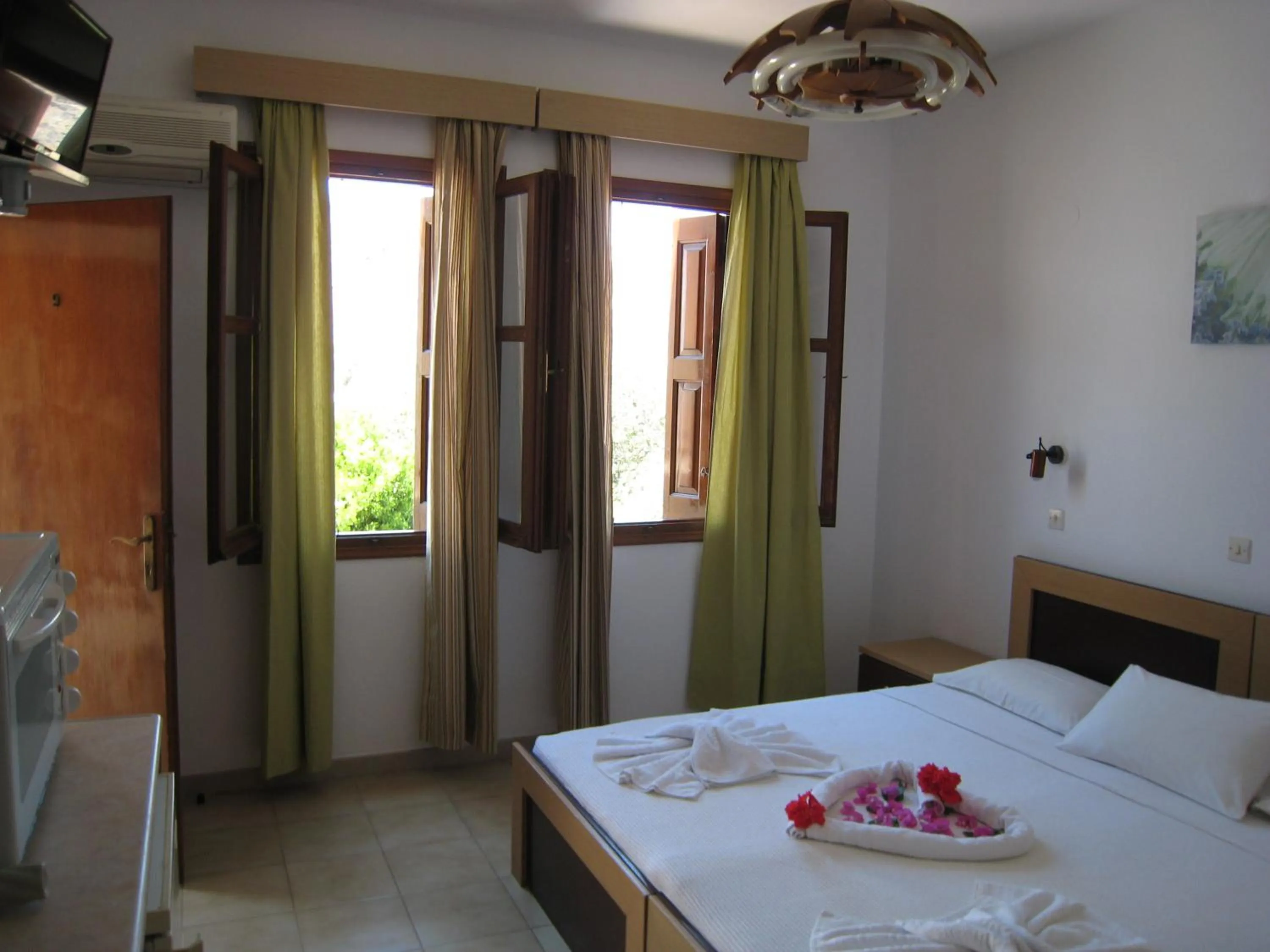 Bed in Eleftheria Lindian Studios II