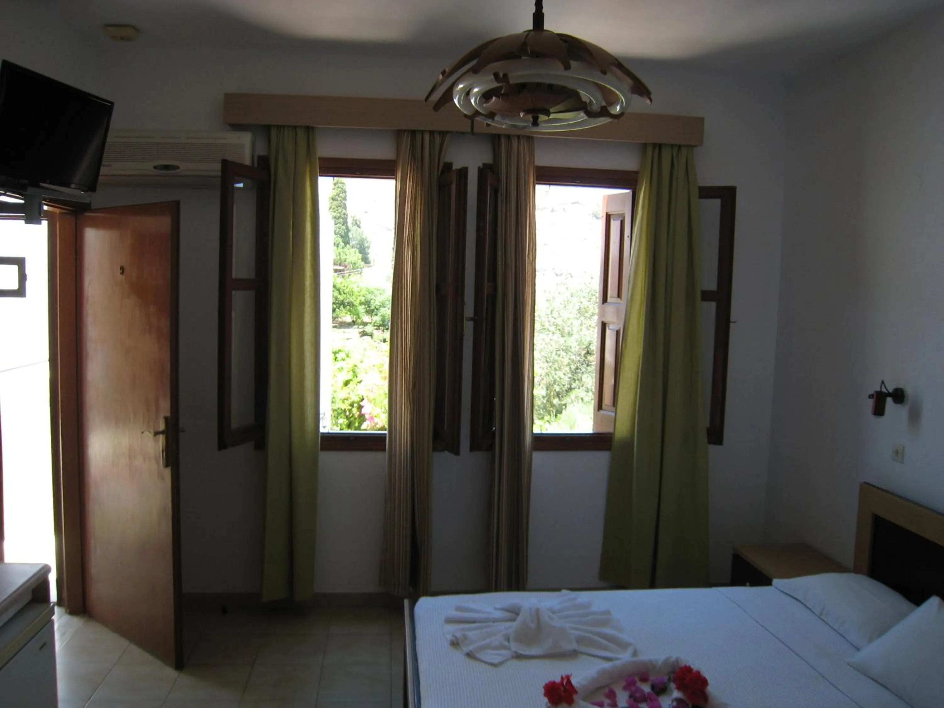 Bed in Eleftheria Lindian Studios II