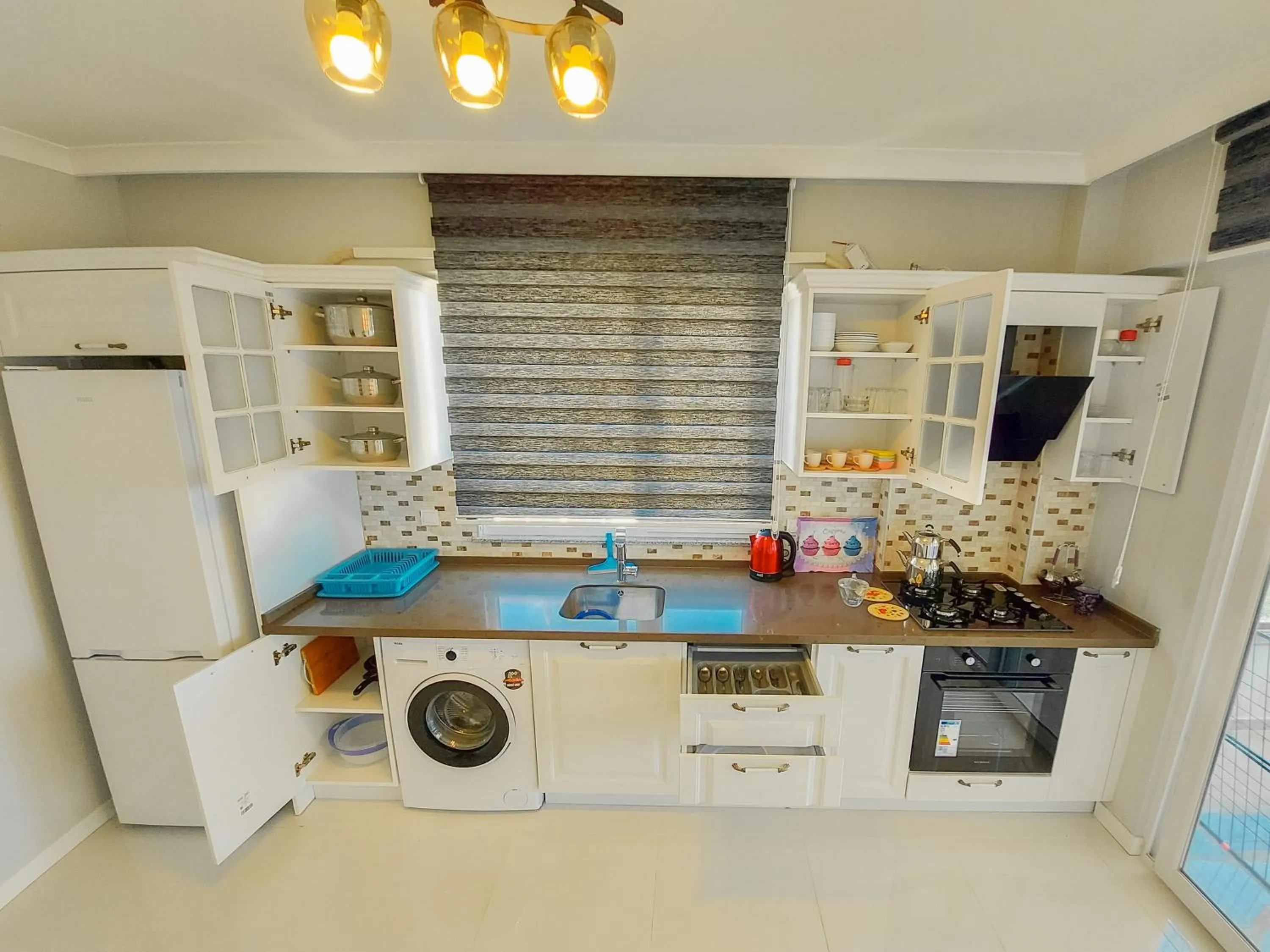 Kitchen or kitchenette in ELEGANT BLUE SUİTES