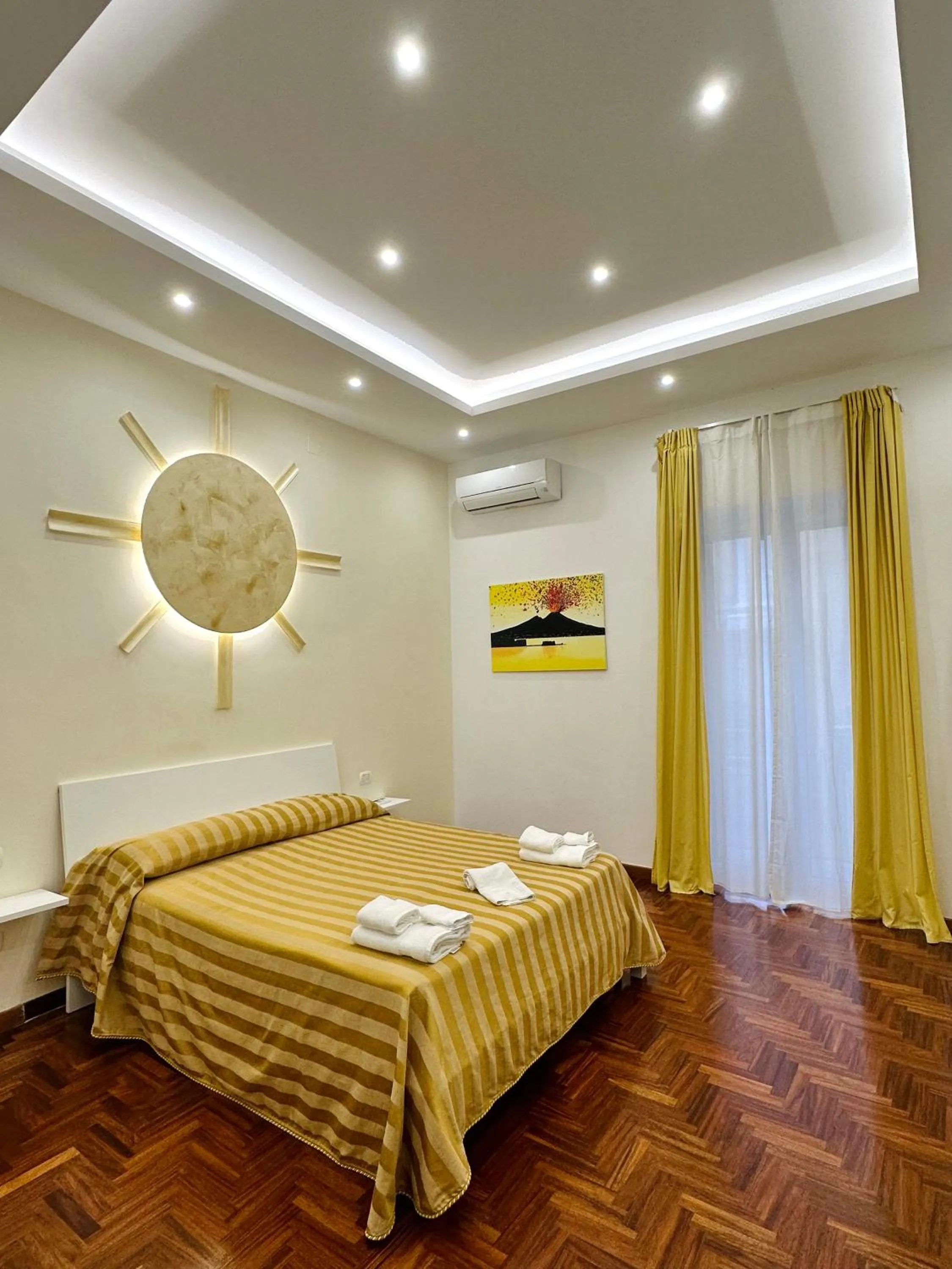 Bed in SoLuMa' Chiaja Rooms