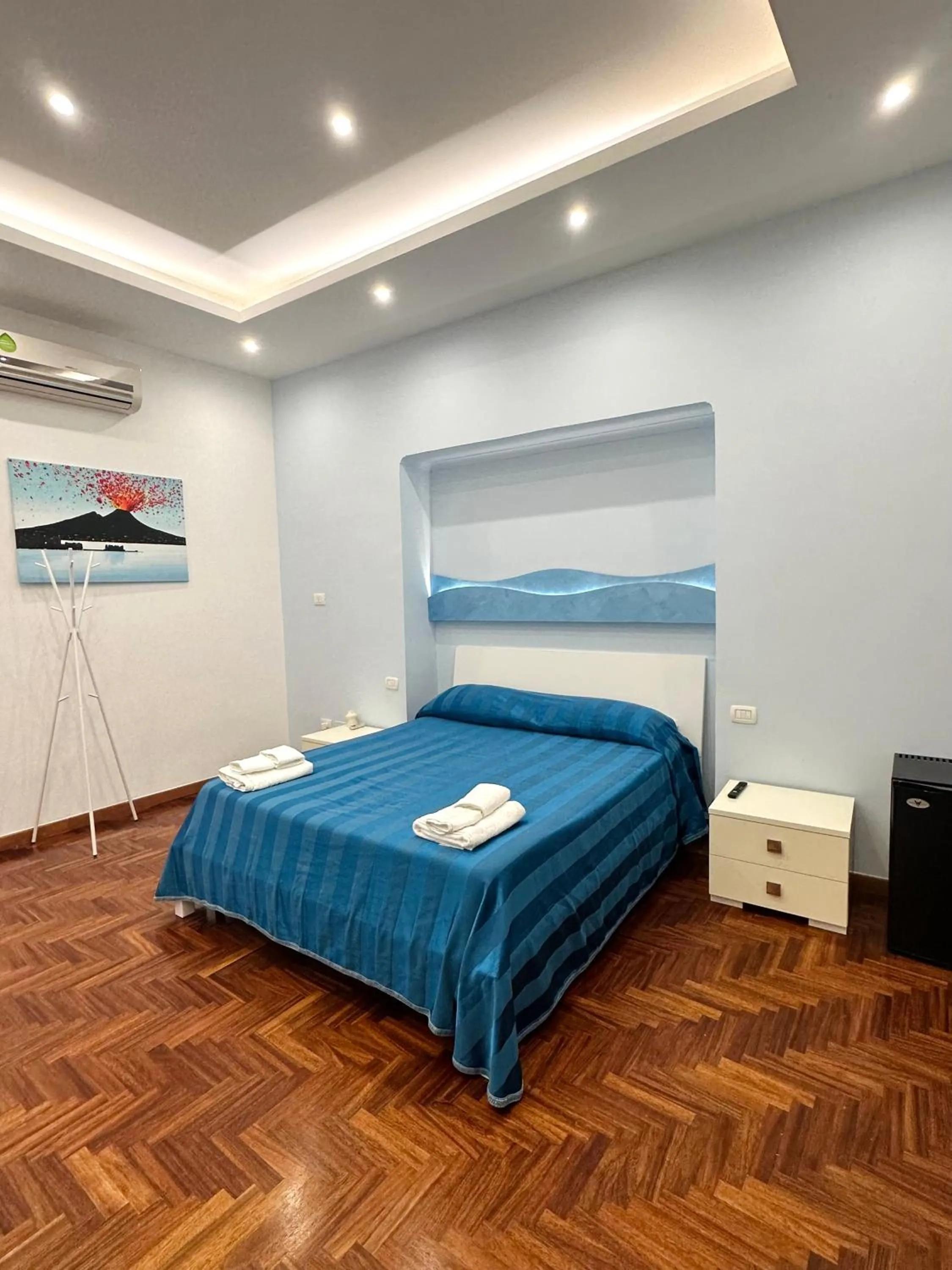 Bed in SoLuMa' Chiaja Rooms