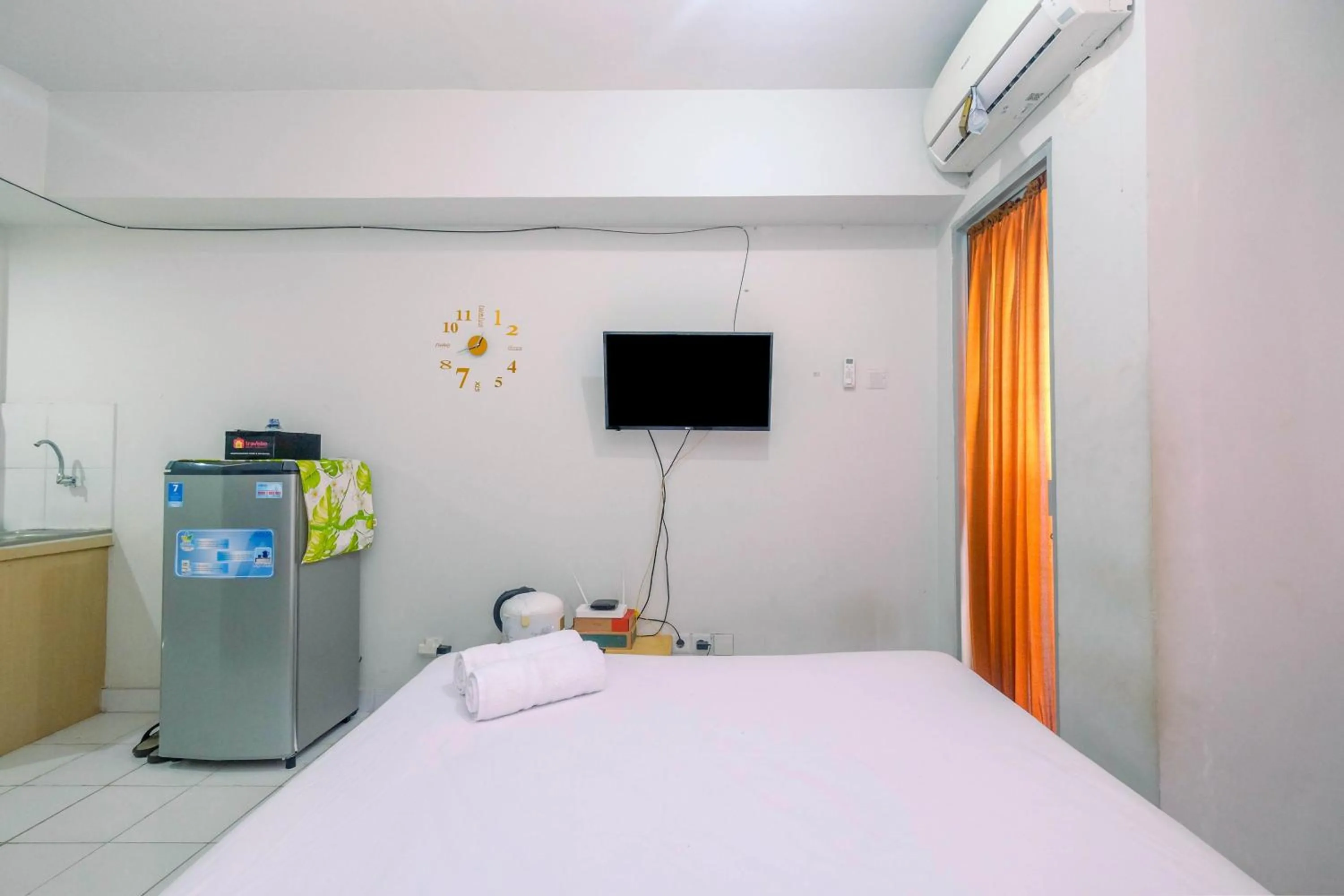 Bed in Comfortable and Homey Studio Apartment at Dramaga Tower near IPB By Travelio
