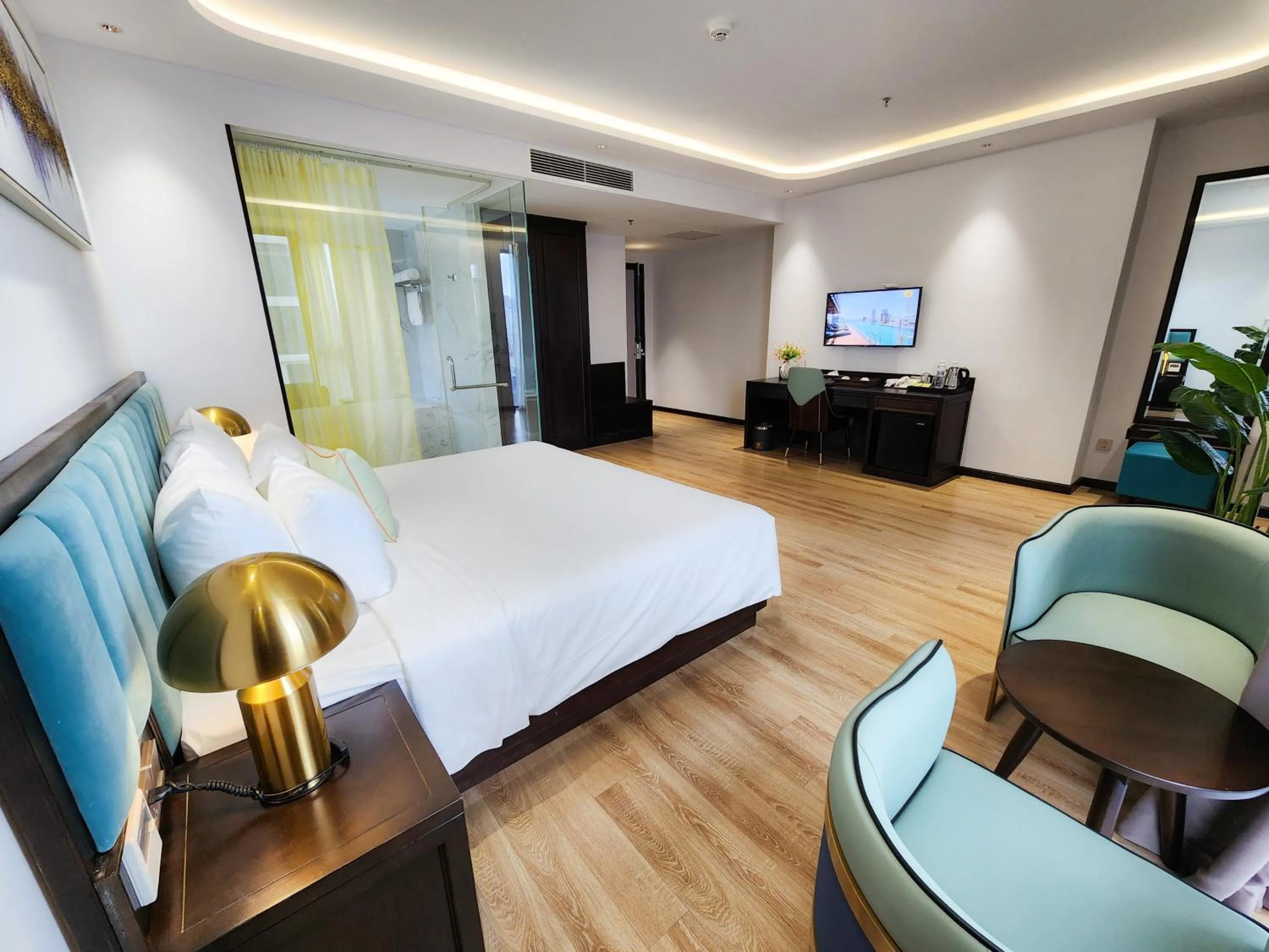 Communal lounge/ TV room, Bed in Cordial Grand Hotel Da Nang Beach - Infinity Rooftop Pool