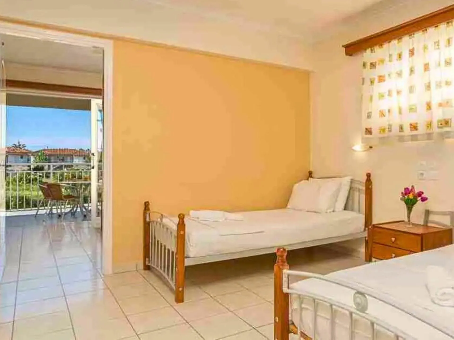 Bed in Manousis ApartHotel