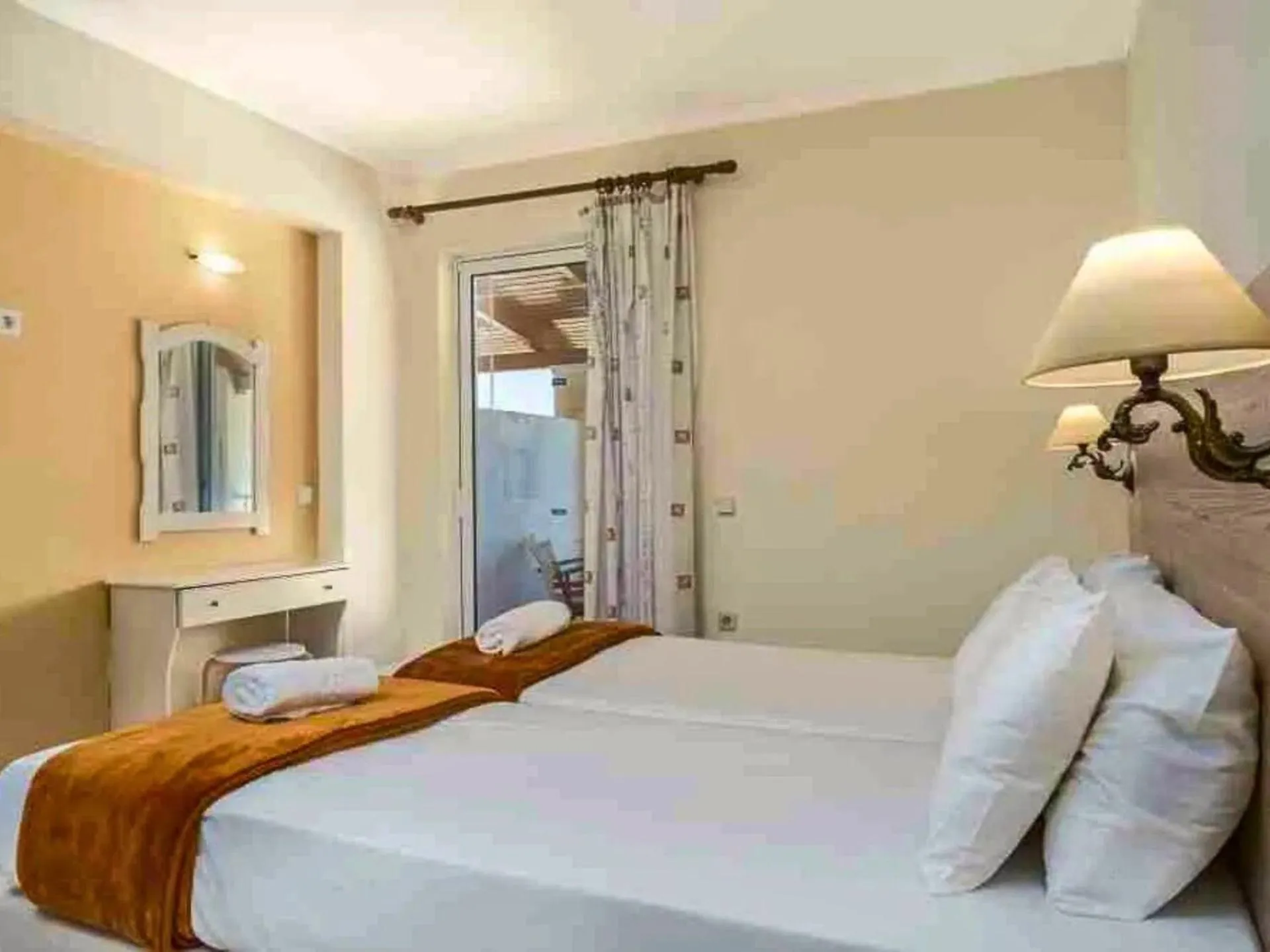 Bed in Manousis ApartHotel