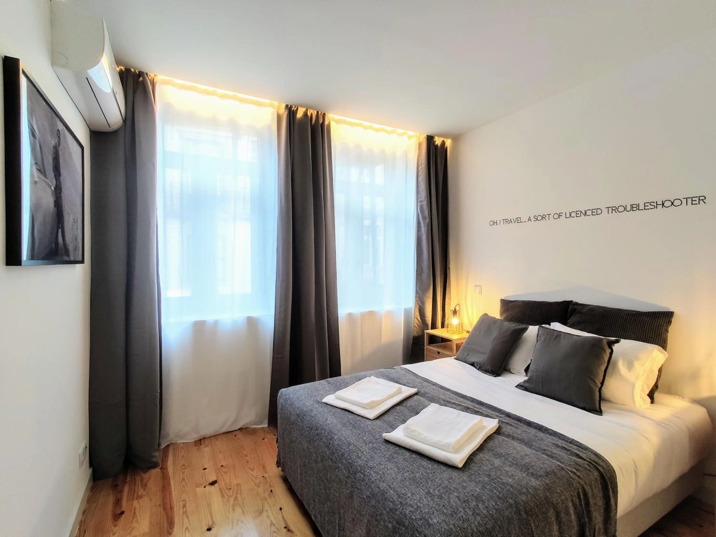 Bedroom in Bombarda Cinema Apartments