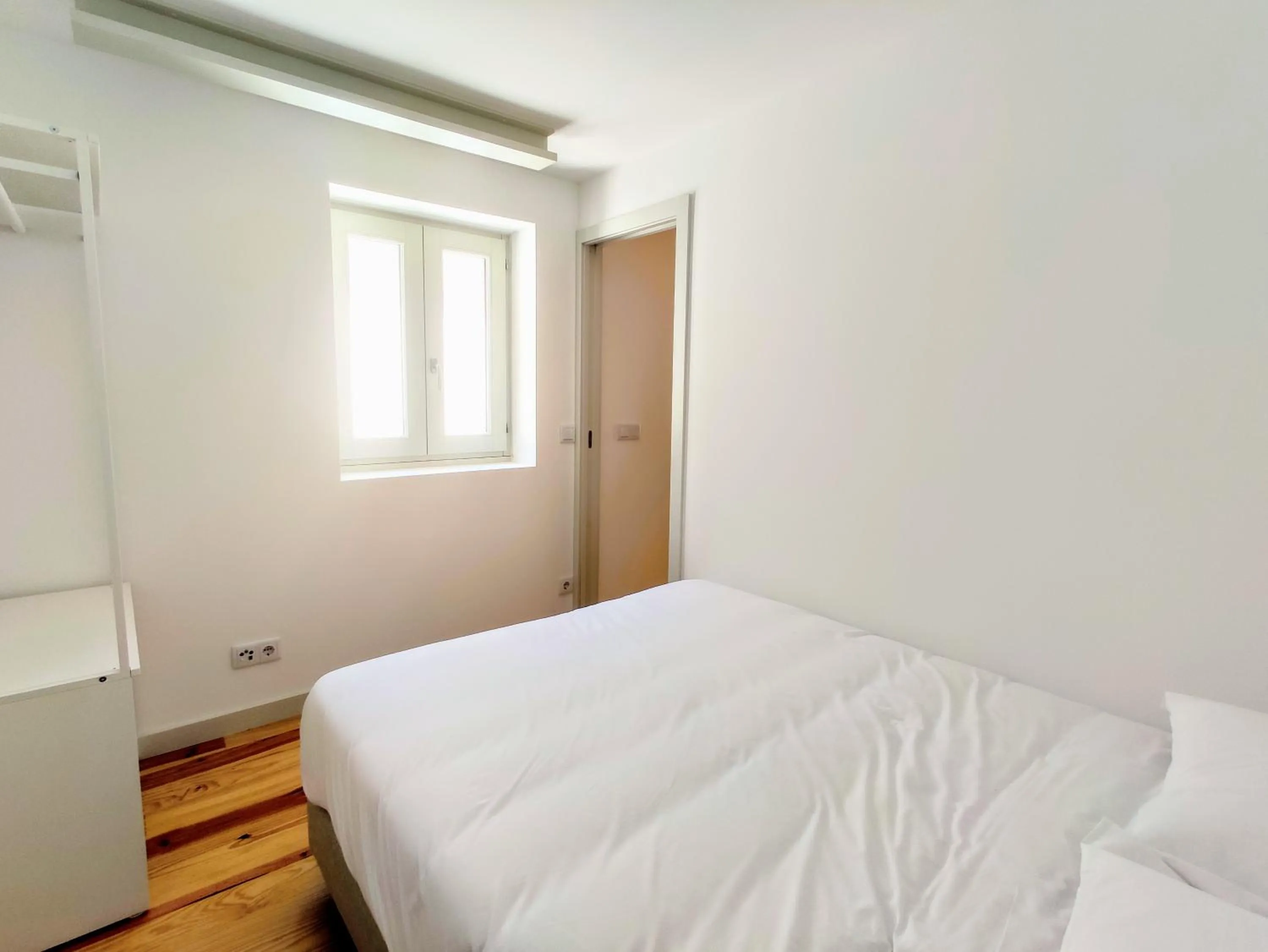 Bed in Bombarda Cinema Apartments