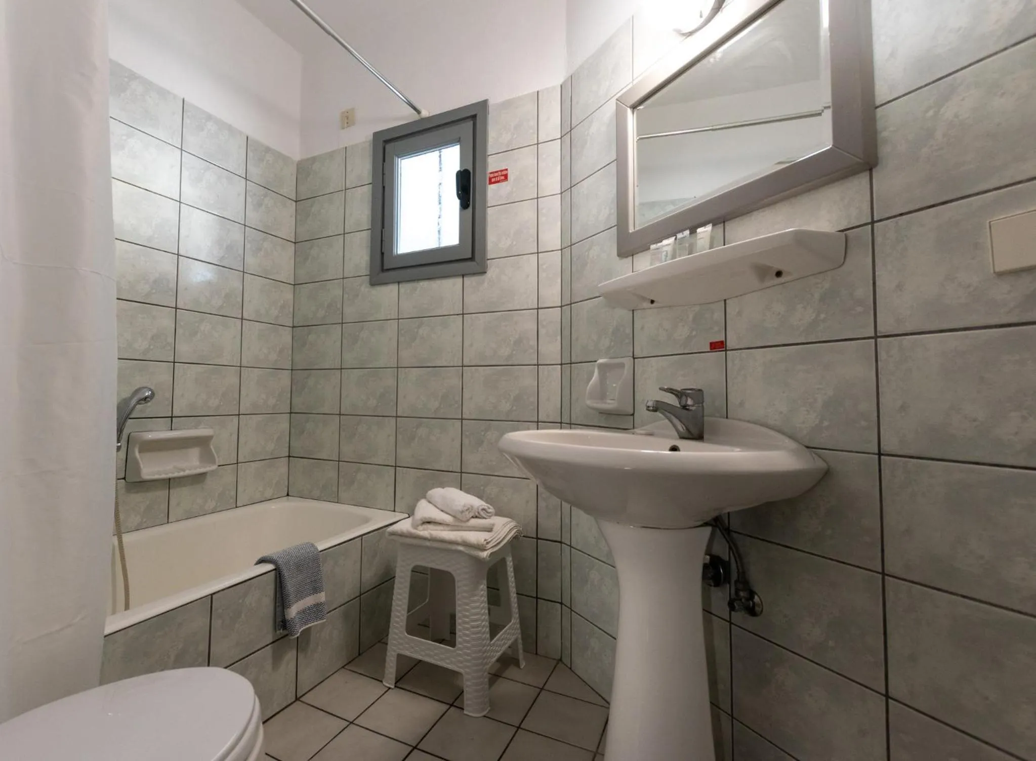 Bathroom in Dedalos Hotel