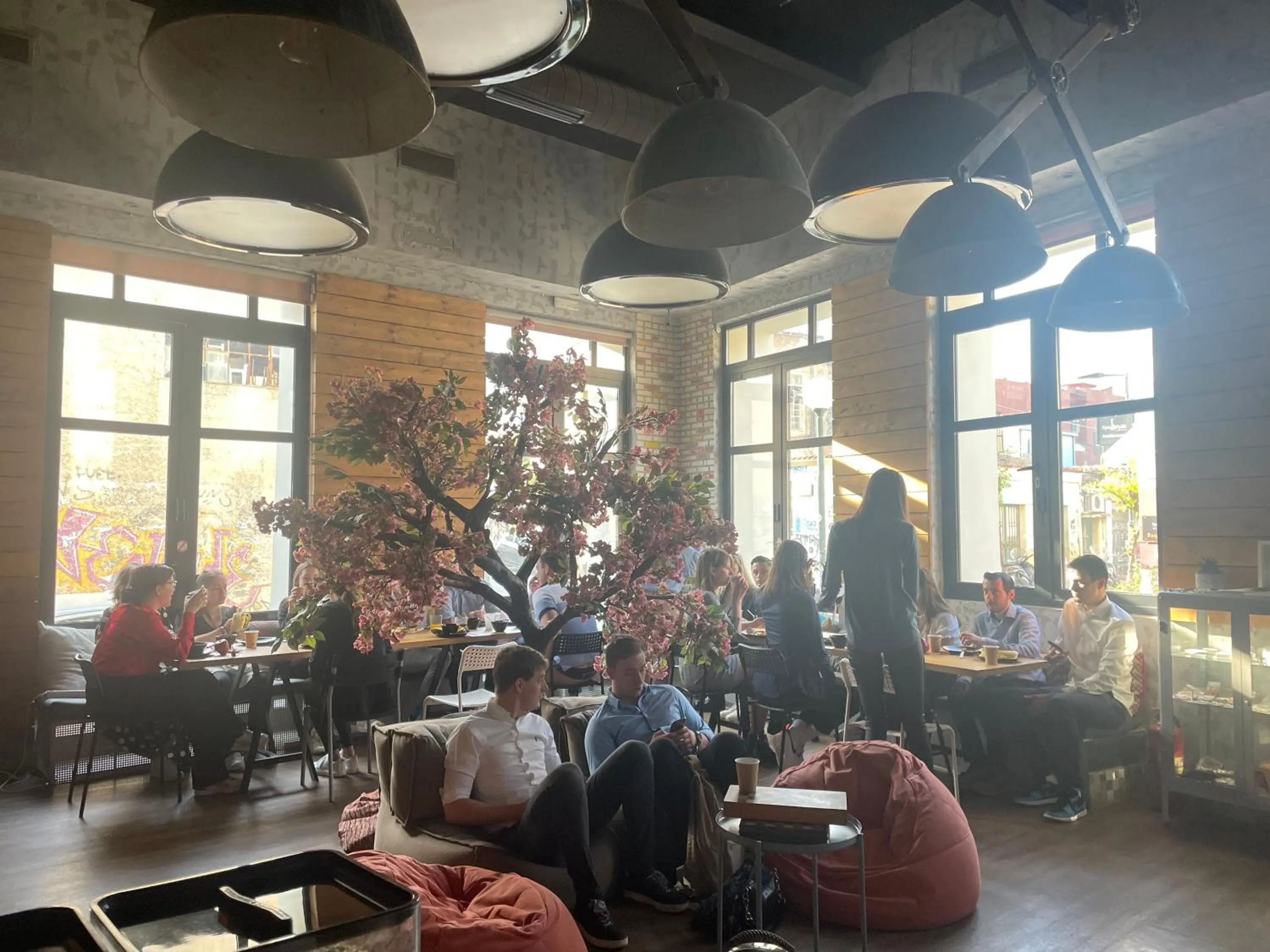 Communal lounge/ TV room in Iconic Athens Hostel