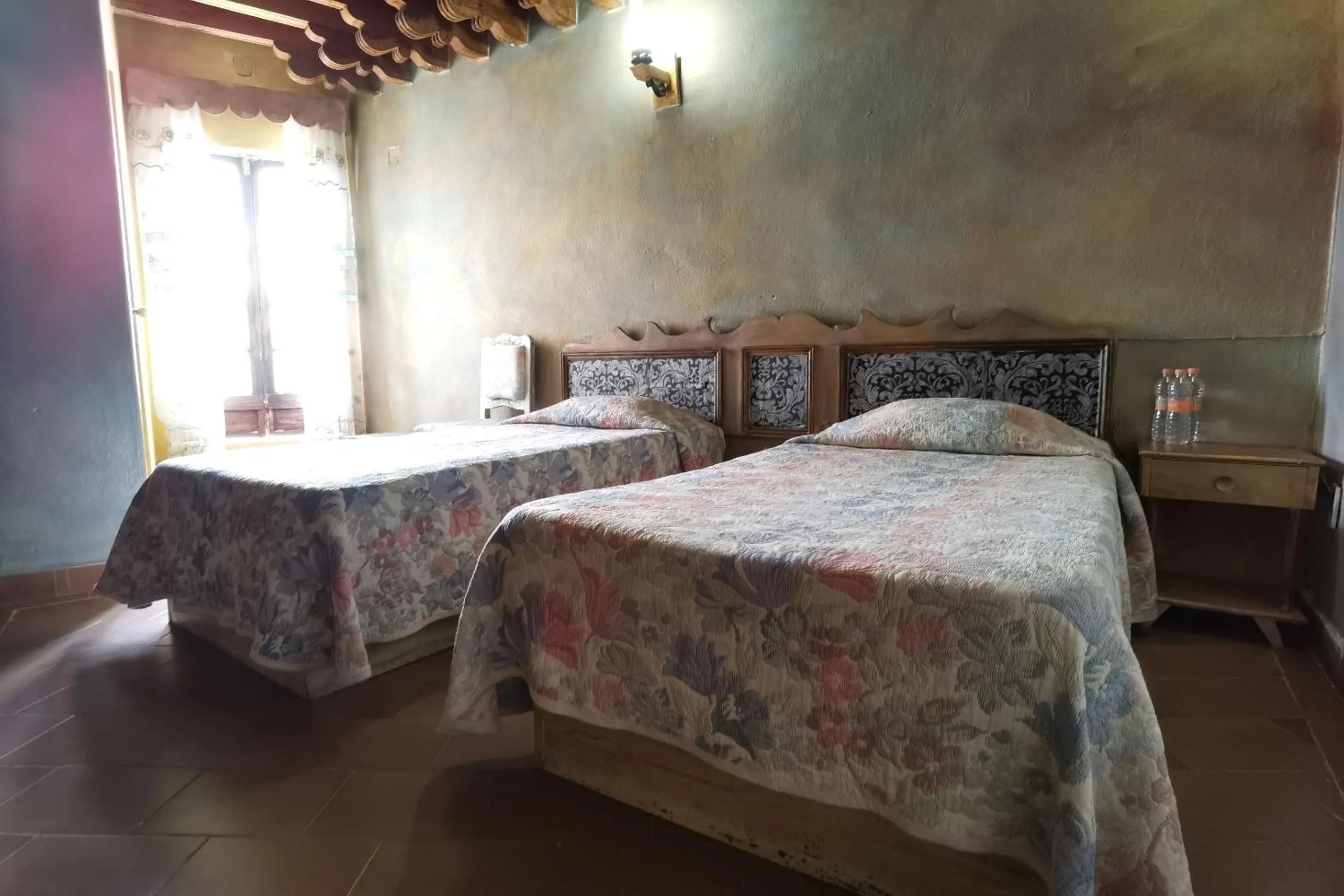 Bedroom in CAPITAL O Meson De La Fragua