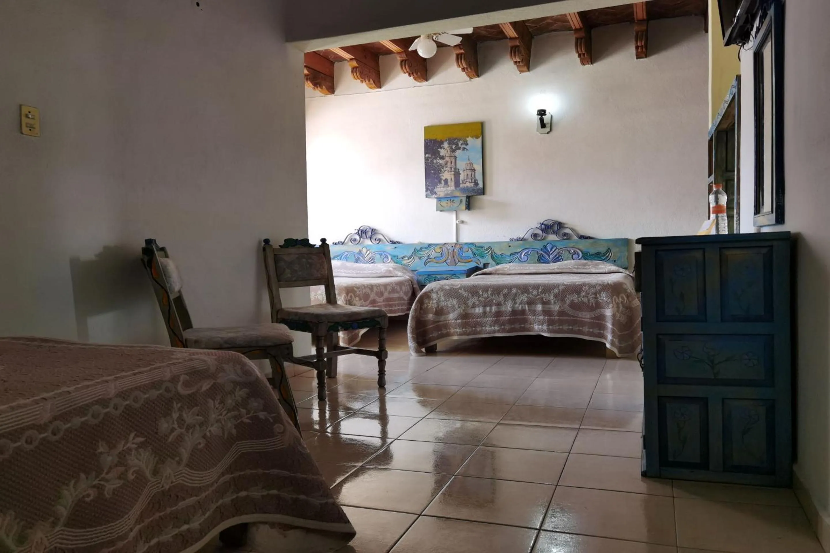 Bedroom in CAPITAL O Meson De La Fragua