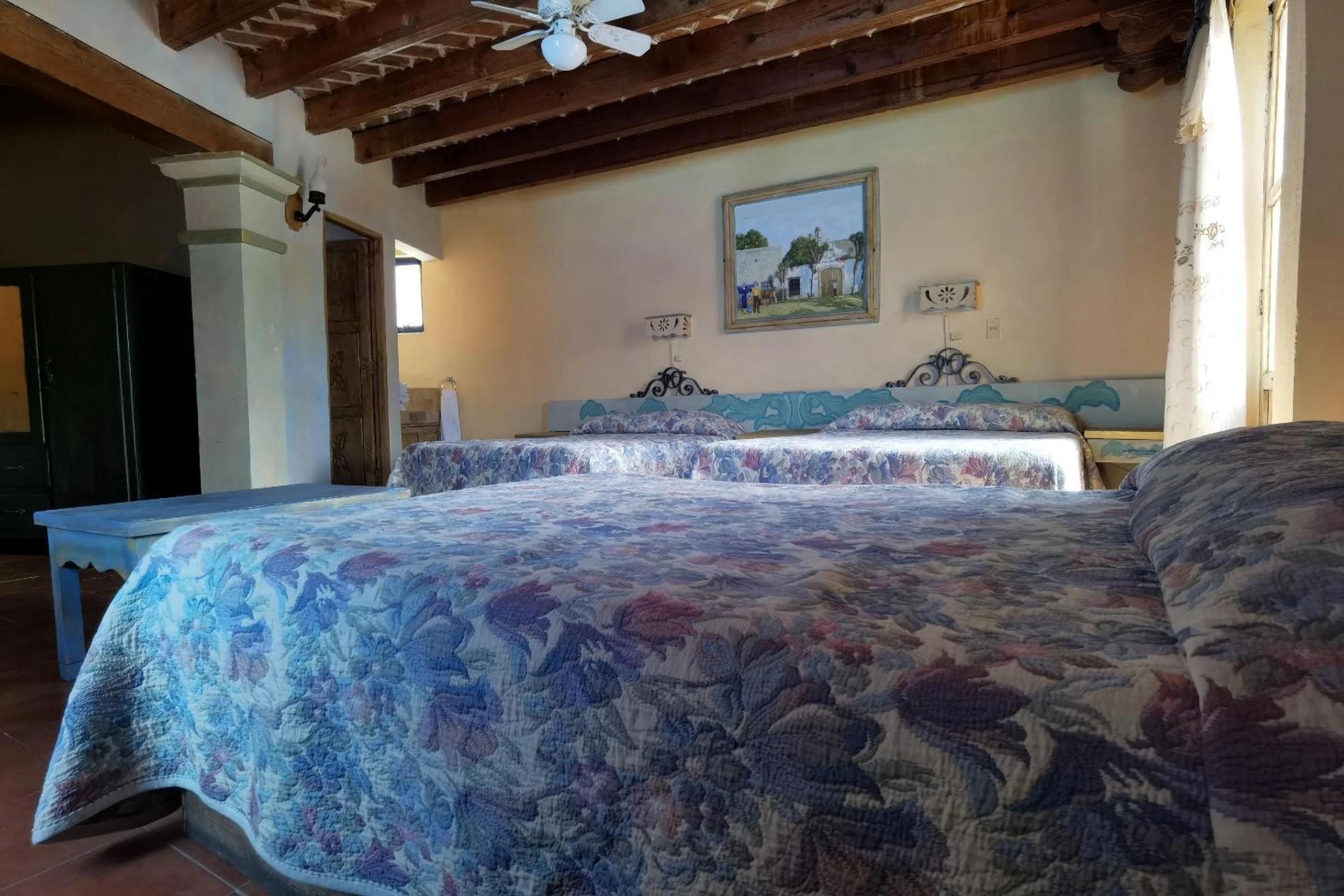 Bedroom in CAPITAL O Meson De La Fragua