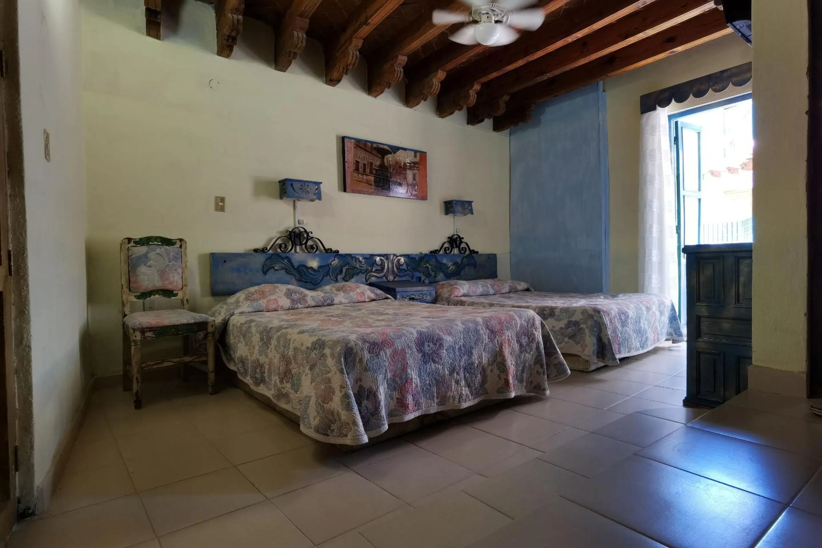 Bedroom in CAPITAL O Meson De La Fragua