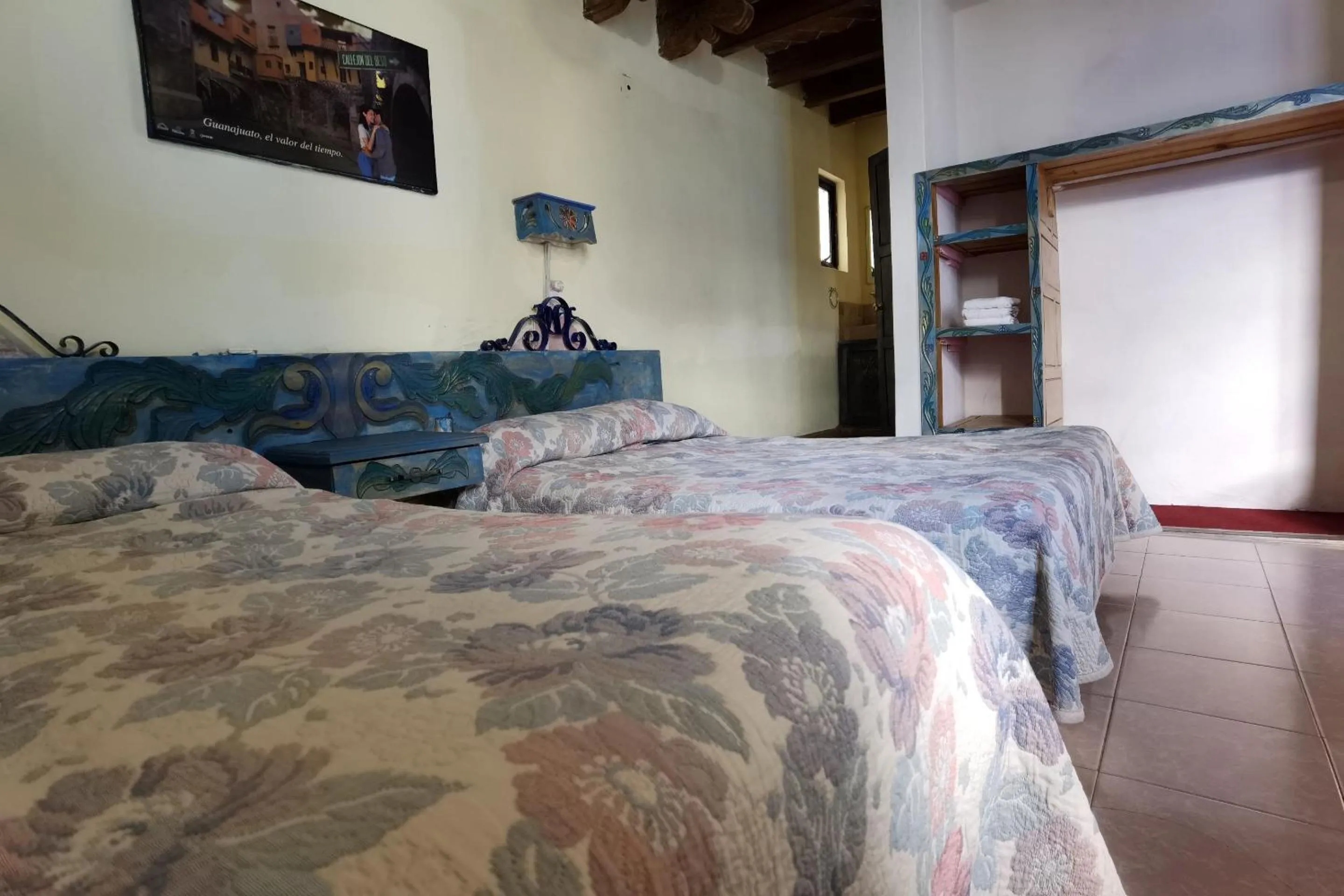 Bedroom in CAPITAL O Meson De La Fragua