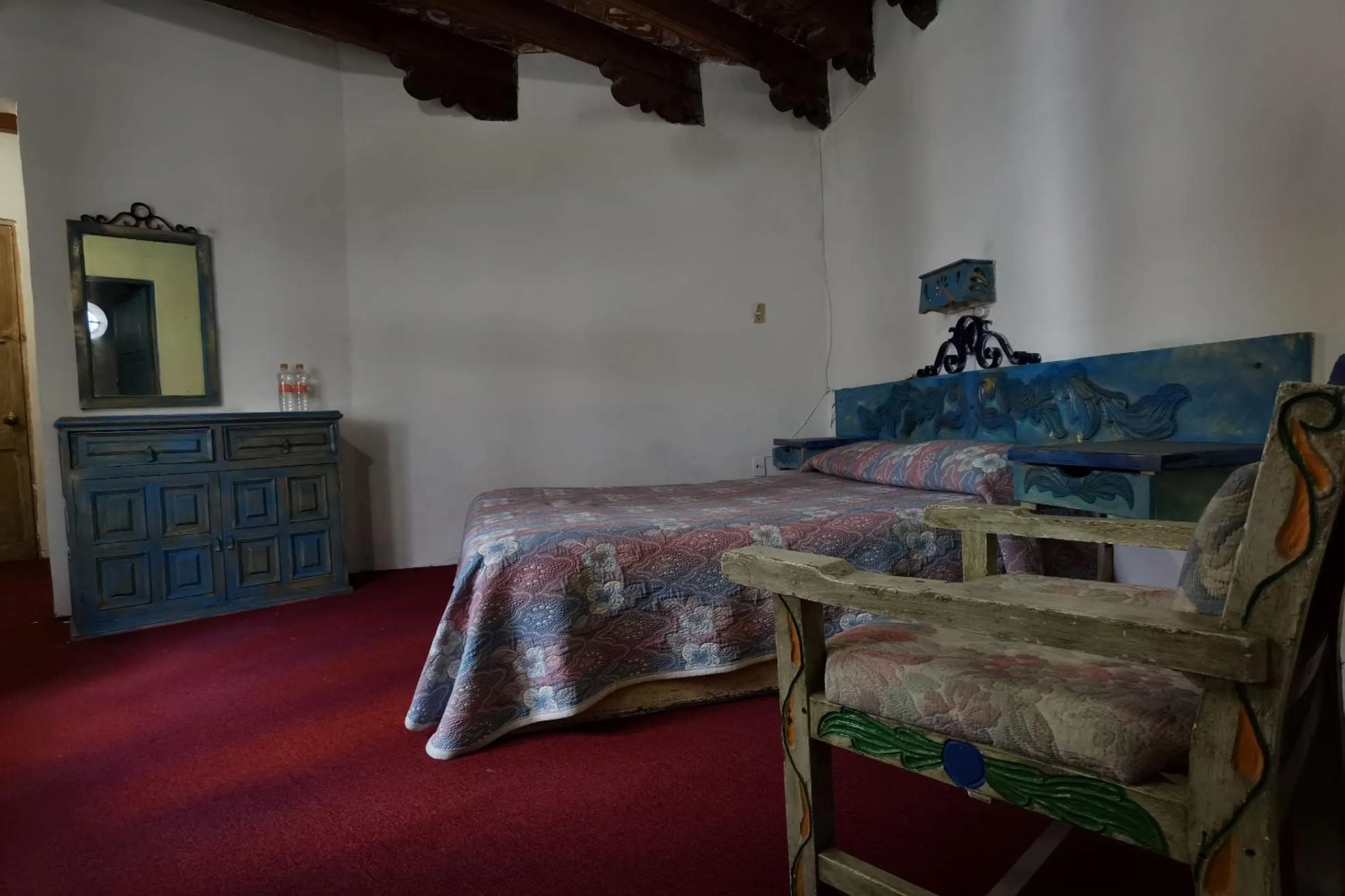 Bedroom in CAPITAL O Meson De La Fragua