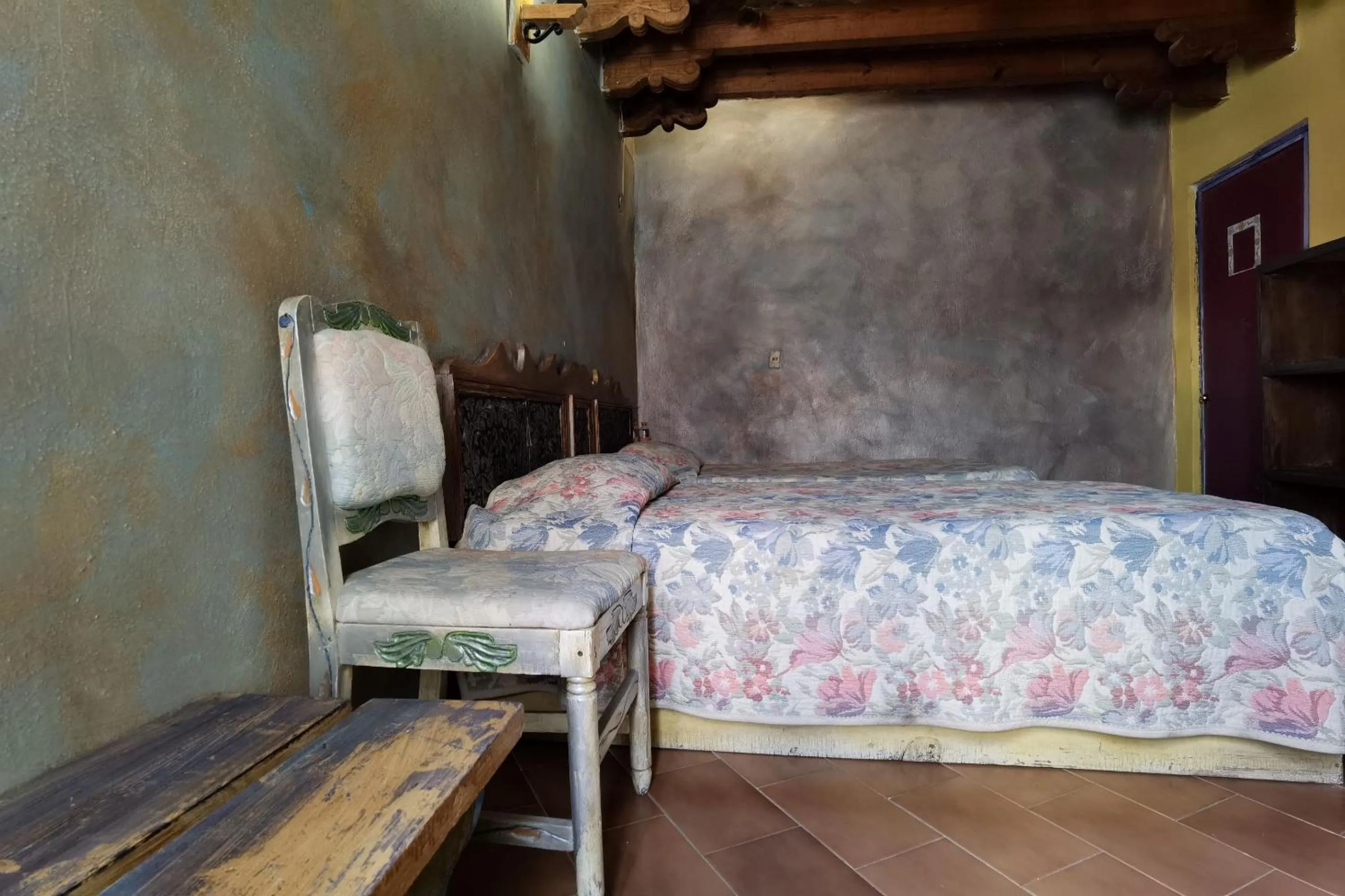 Bedroom in CAPITAL O Meson De La Fragua