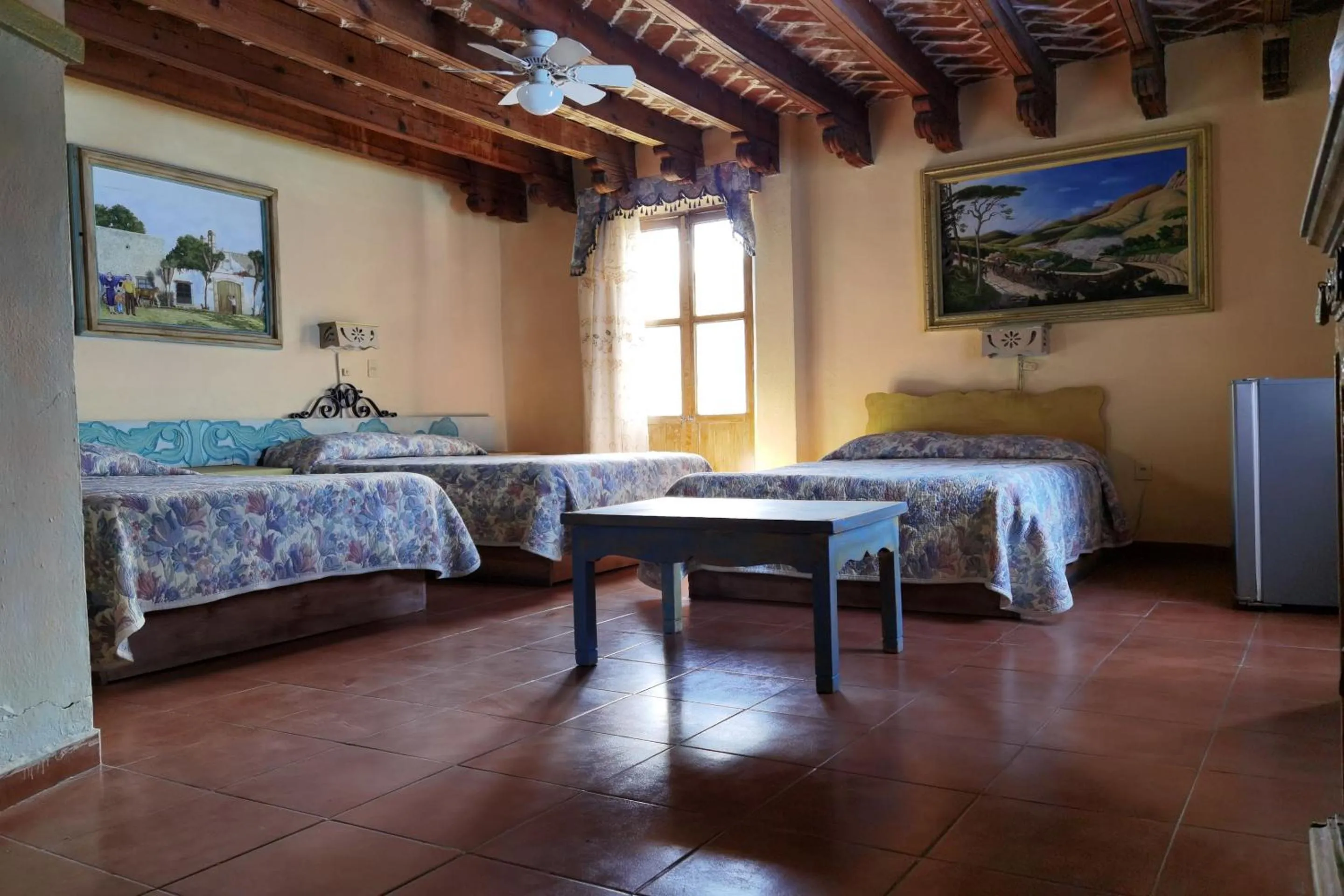 Bedroom in CAPITAL O Meson De La Fragua