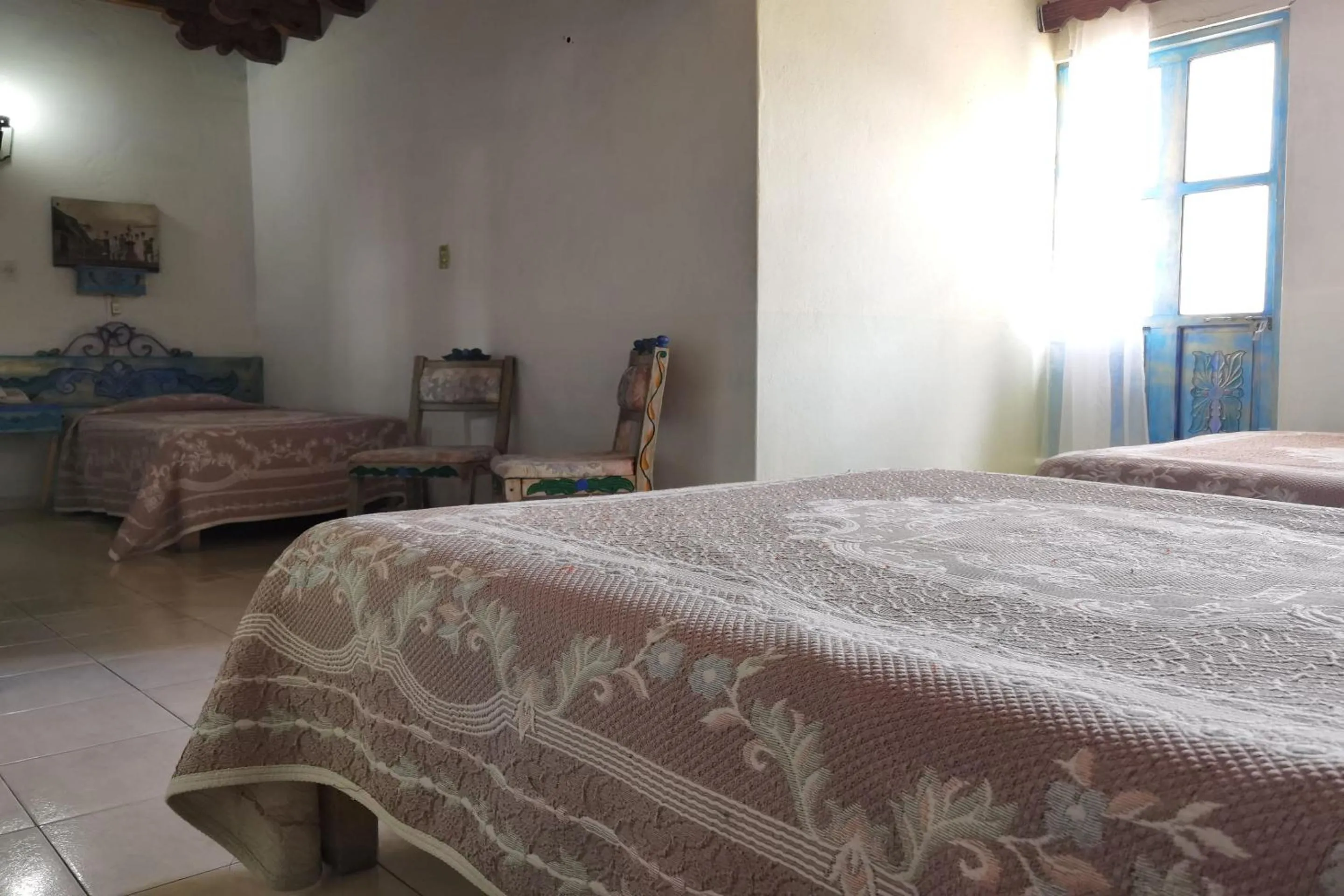 Bedroom in CAPITAL O Meson De La Fragua