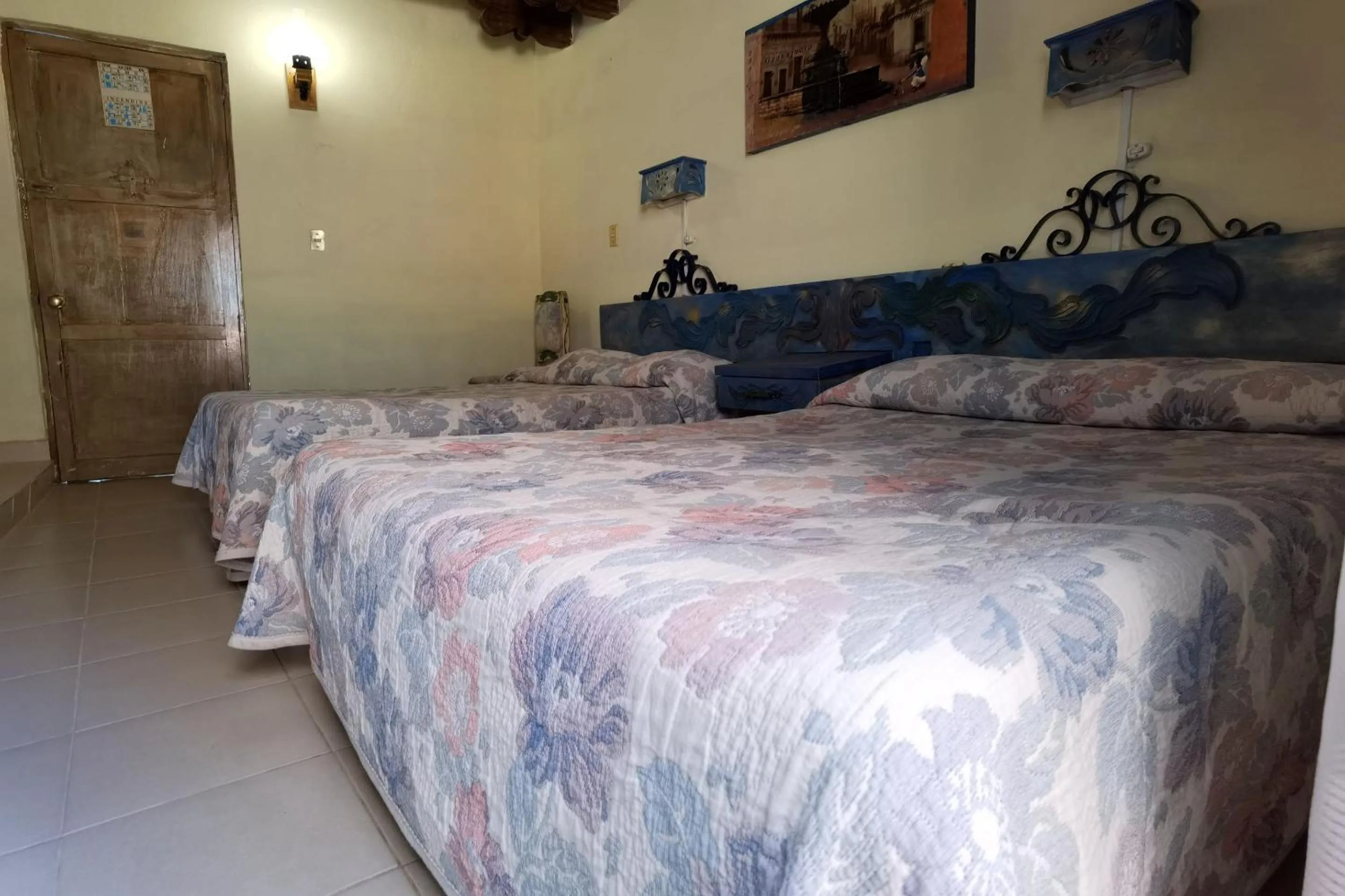 Bedroom in CAPITAL O Meson De La Fragua