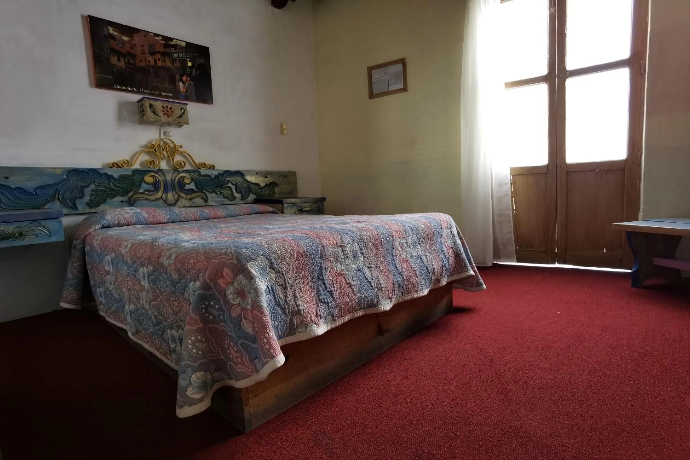 Bedroom in CAPITAL O Meson De La Fragua