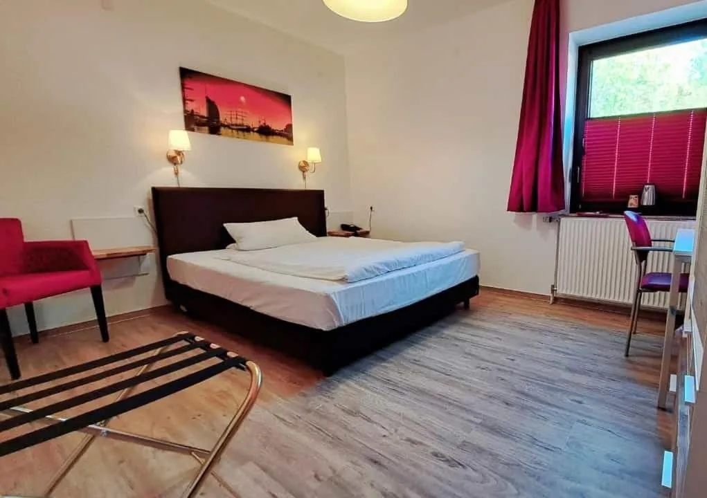 Photo of the whole room, Bed in Hotel Columbus und Glamping