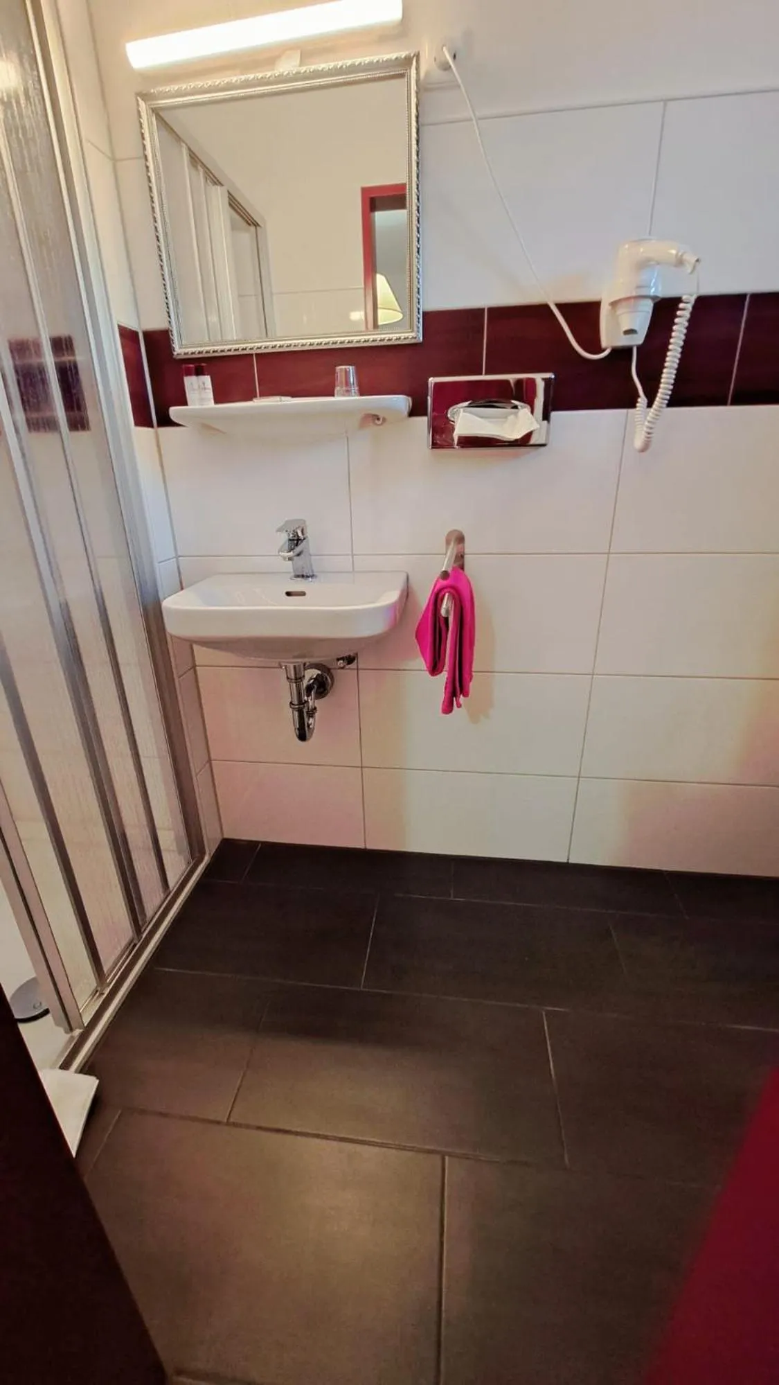 Bathroom in Hotel Columbus und Glamping