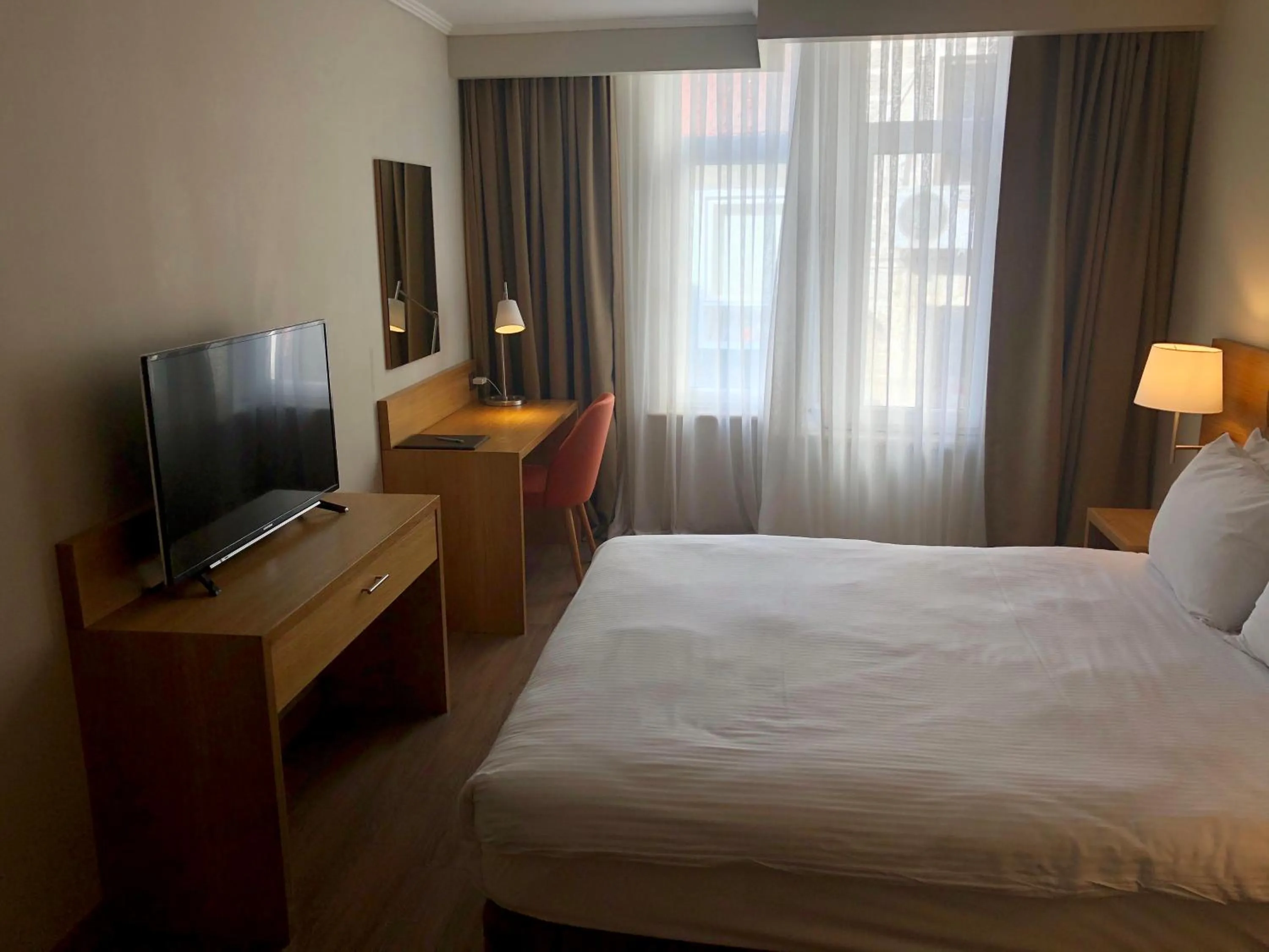 Bedroom in Fehmi Bey Suites