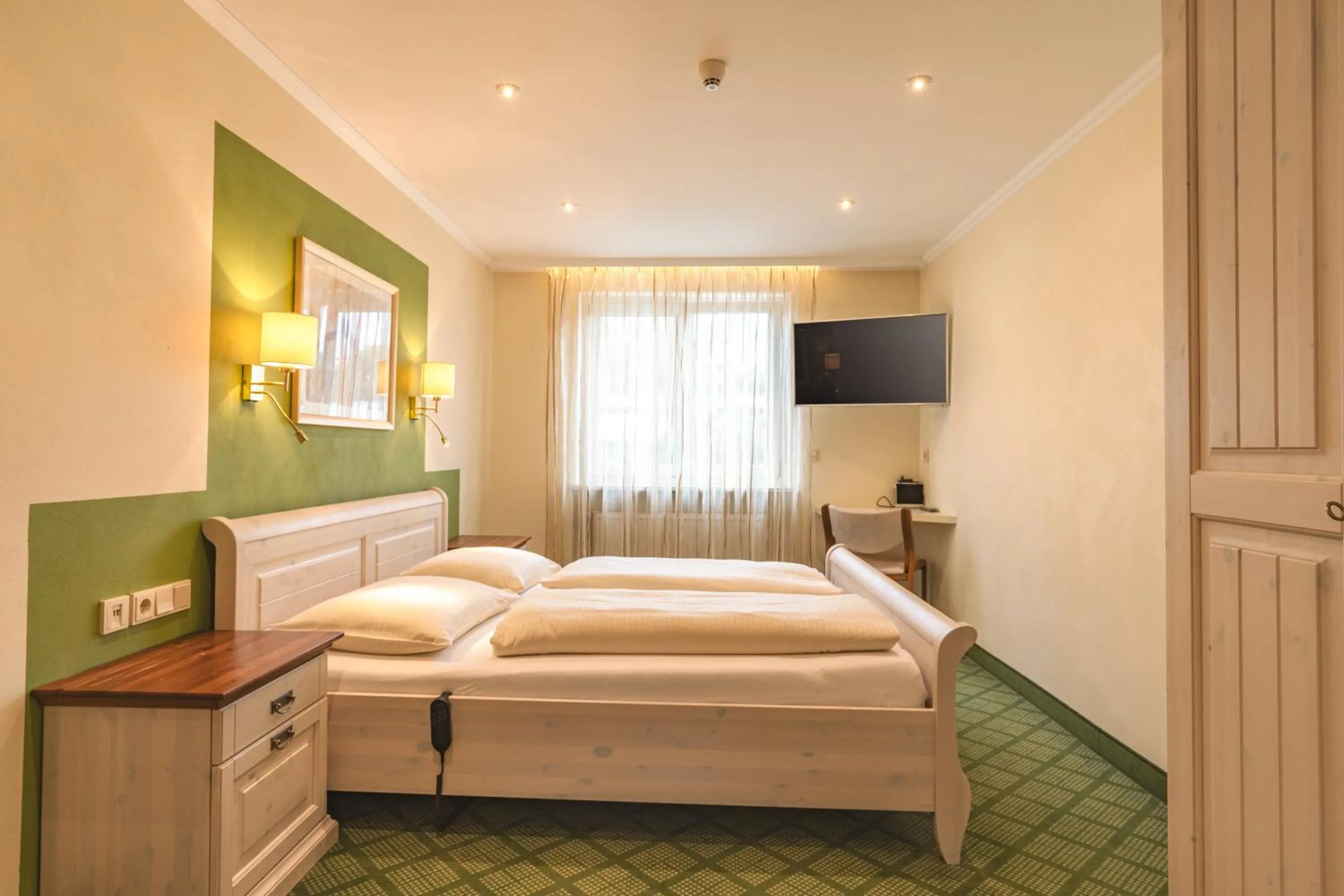 Bed in Parkhotel Crombach