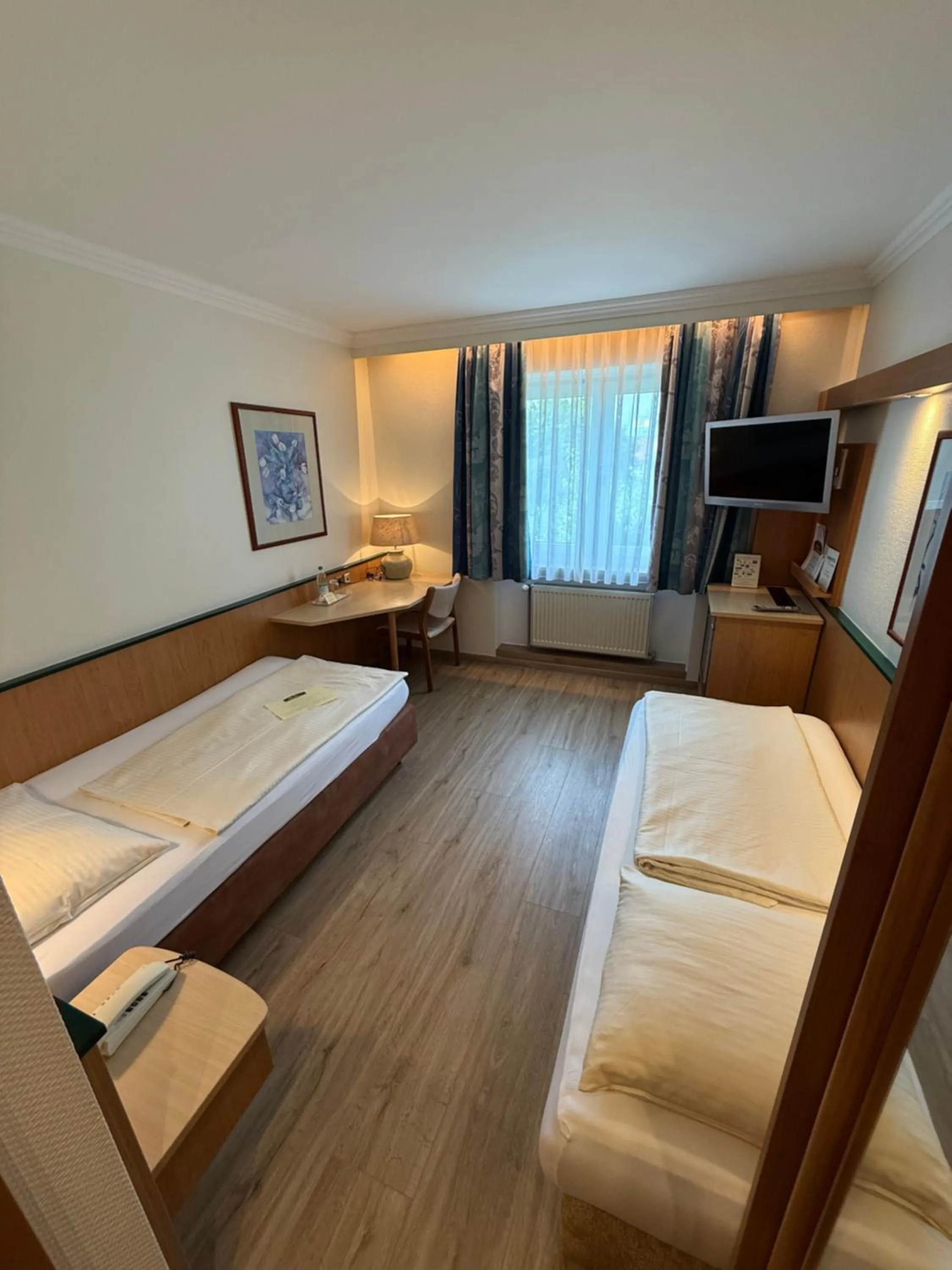 Photo of the whole room, Bed in Parkhotel Crombach