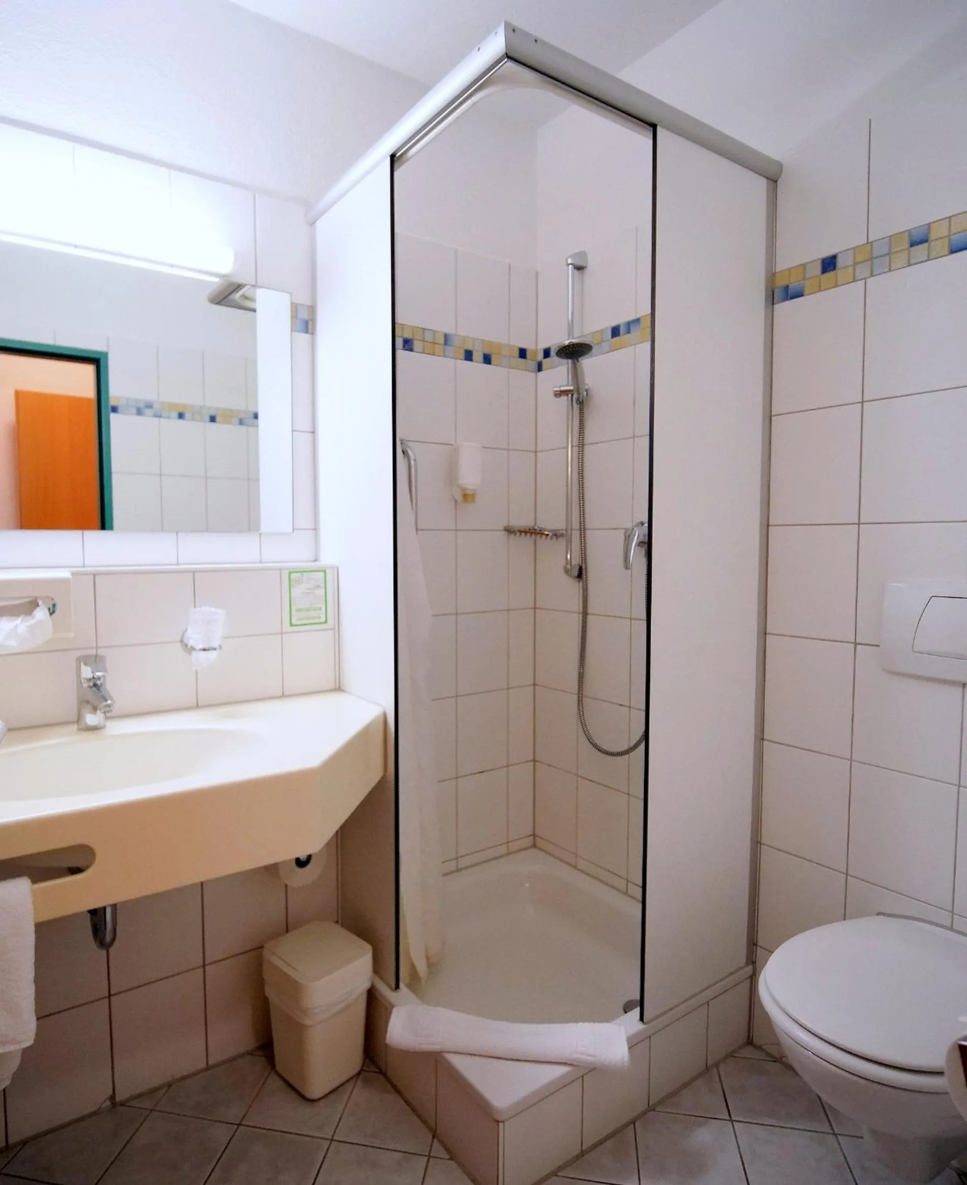 Bathroom in Hotel SunParc - SHUTTLE zum Europa-Park Rust 4km & Rulantica 2km