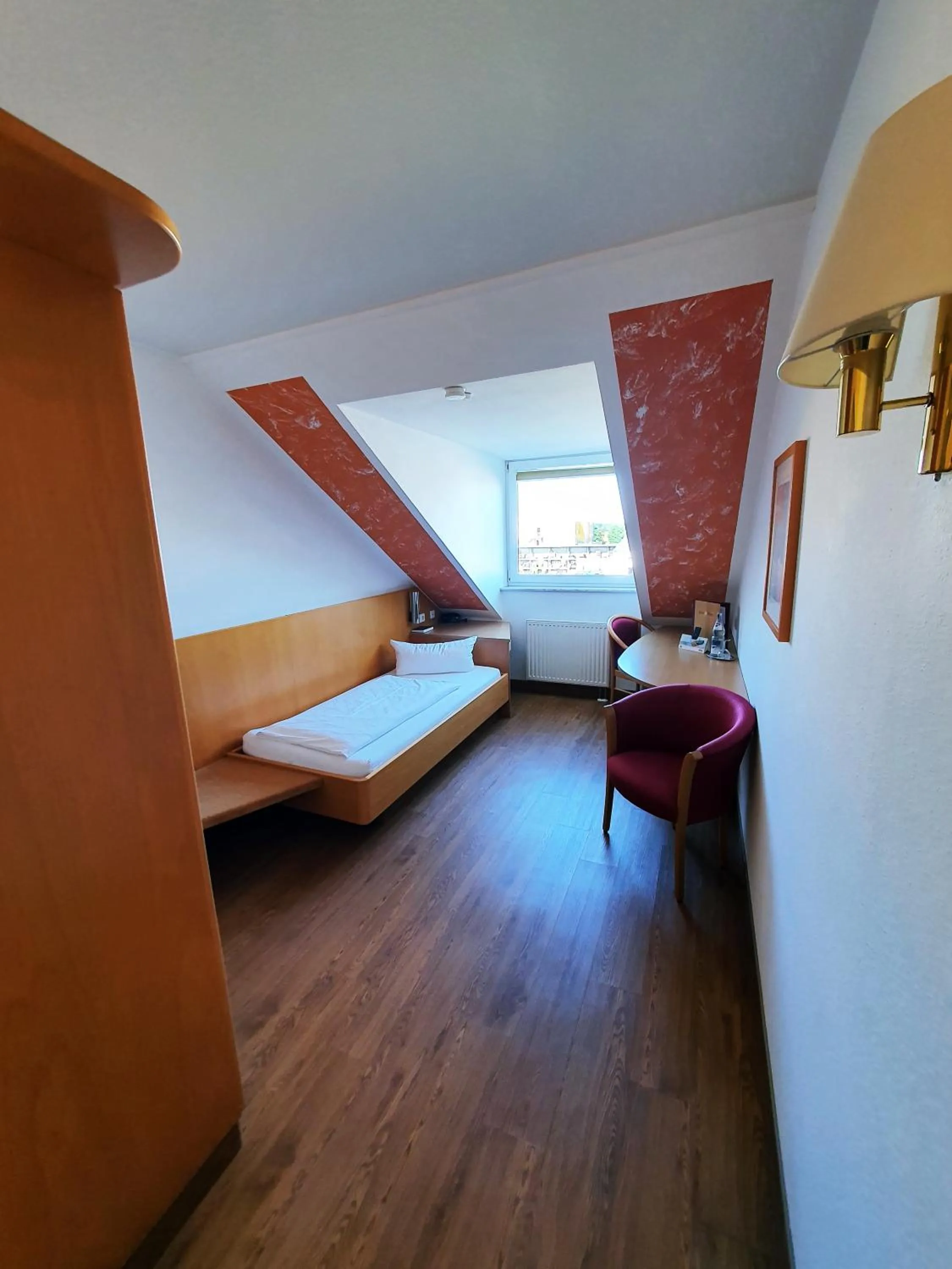 Photo of the whole room, Bed in Hotel SunParc - SHUTTLE zum Europa-Park Rust 4km & Rulantica 2km