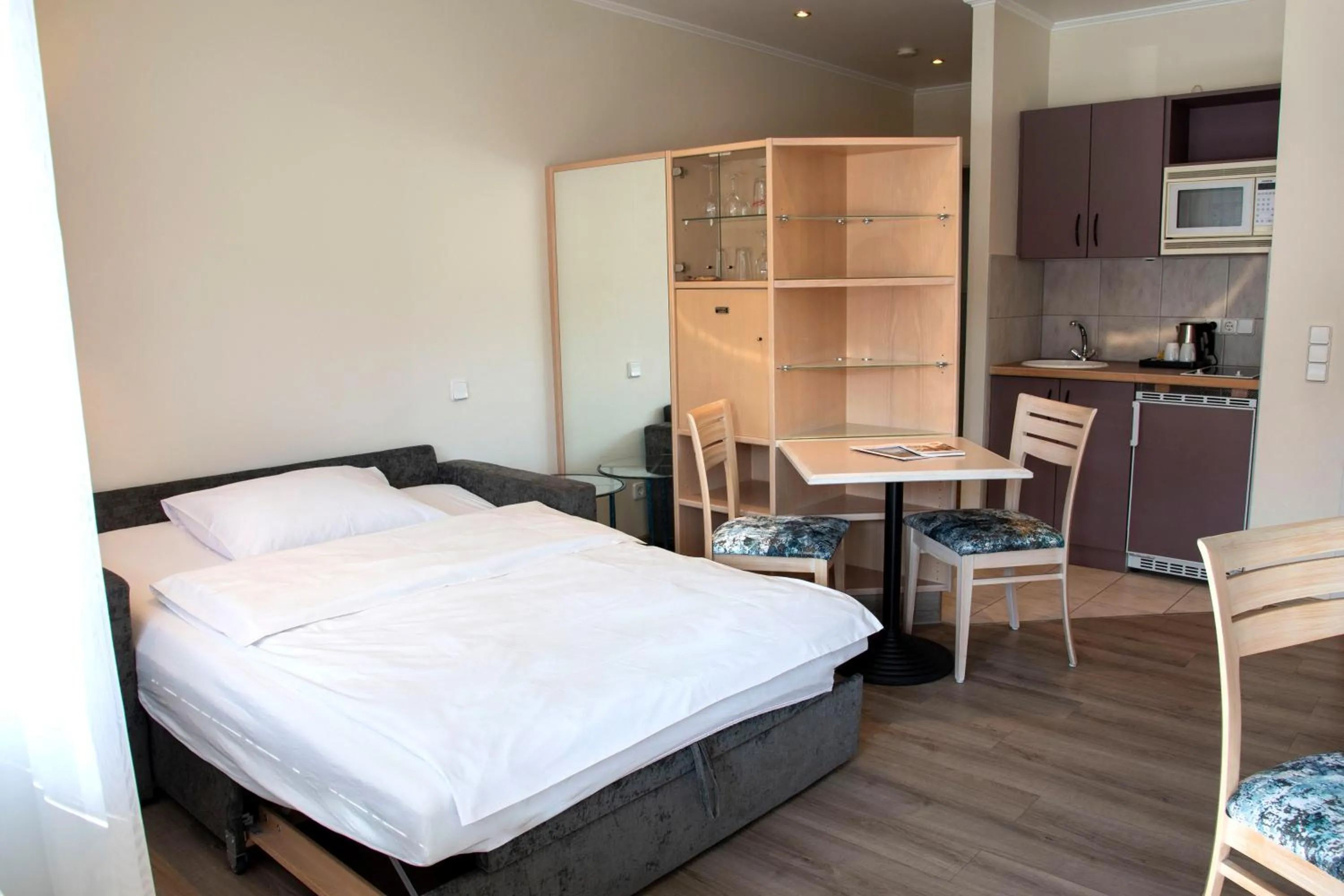 Living room, Bed in Ringhotel Reubel