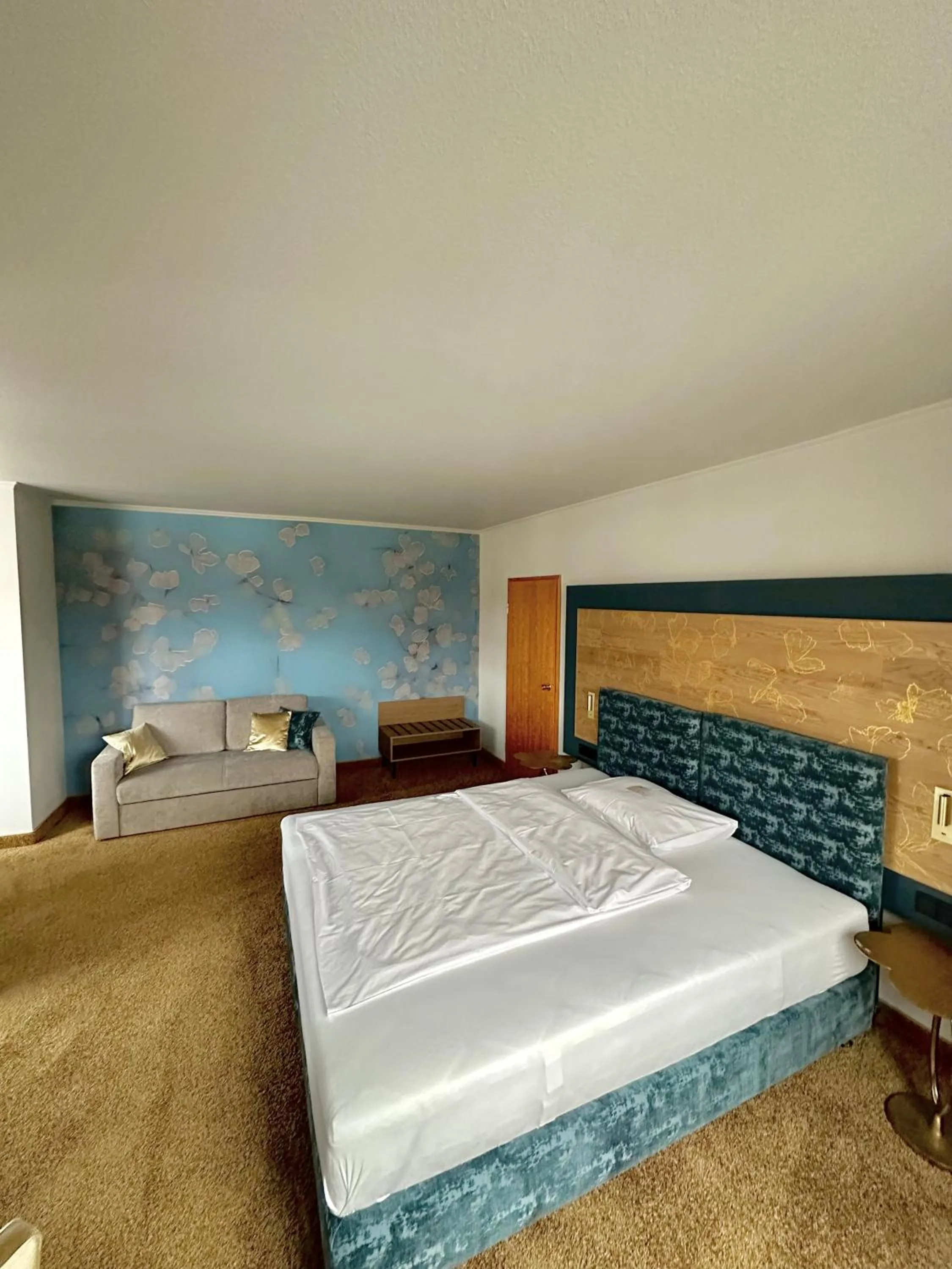 Photo of the whole room, Bed in Ringhotel Reubel