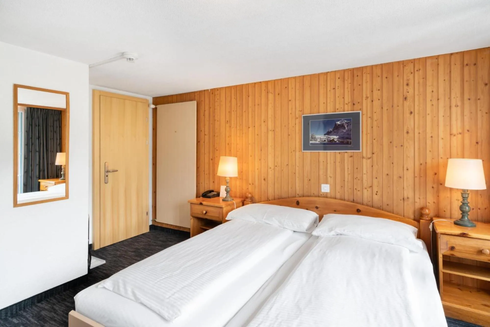 Bedroom, Bed in Jungfrau Lodge, Swiss Mountain Hotel