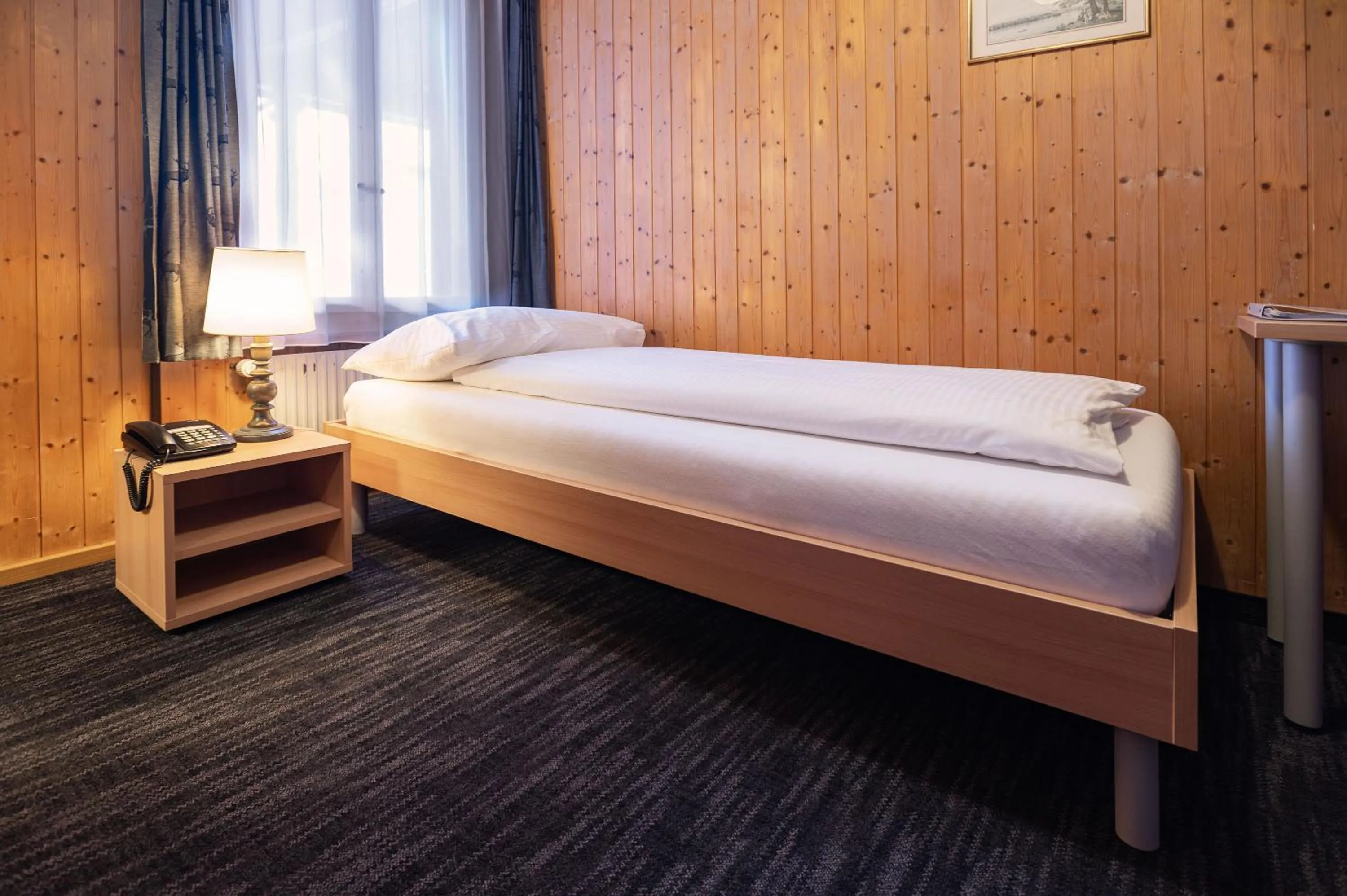 Bedroom, Bed in Jungfrau Lodge, Swiss Mountain Hotel