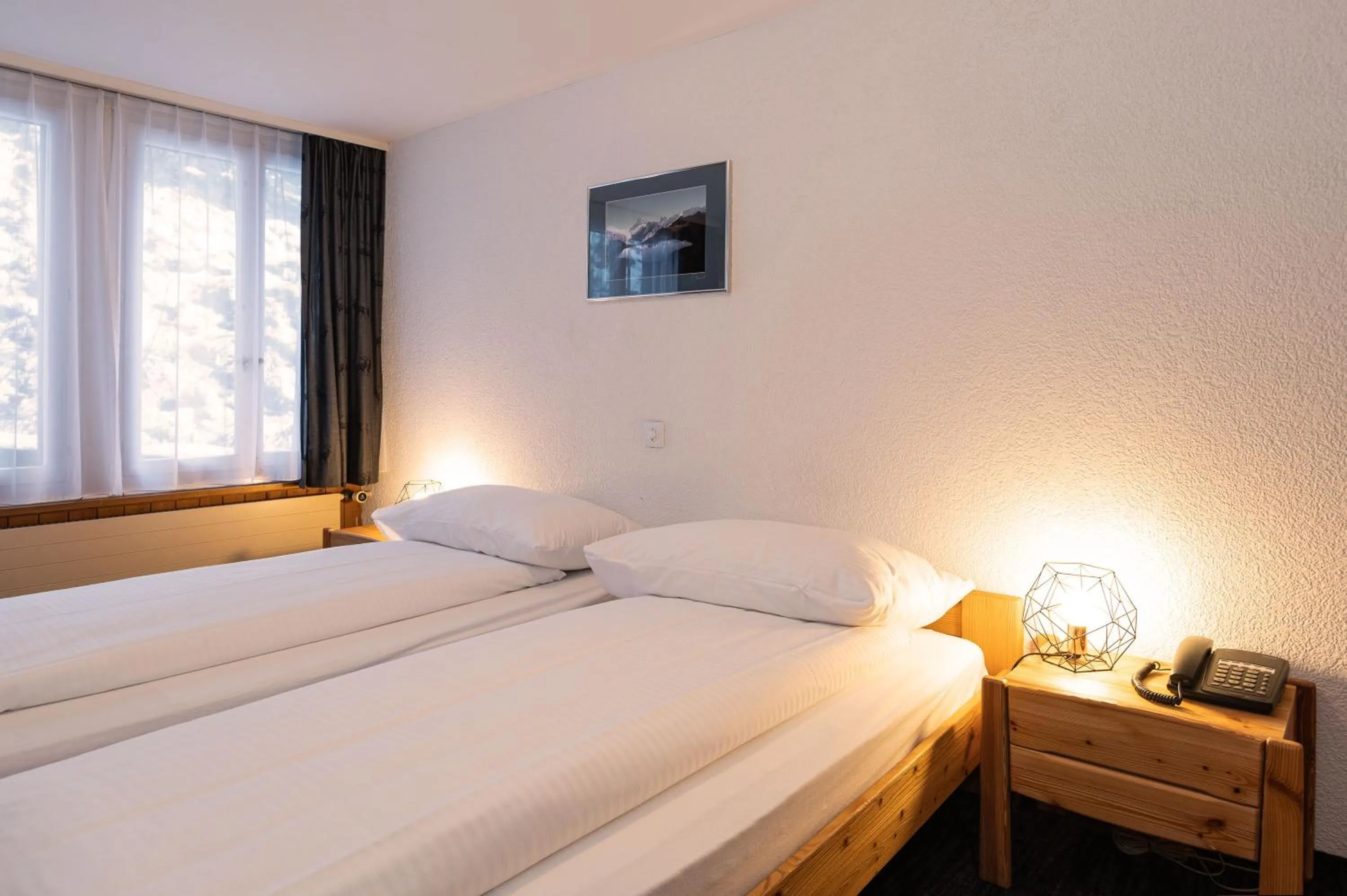 Bedroom, Bed in Jungfrau Lodge, Swiss Mountain Hotel