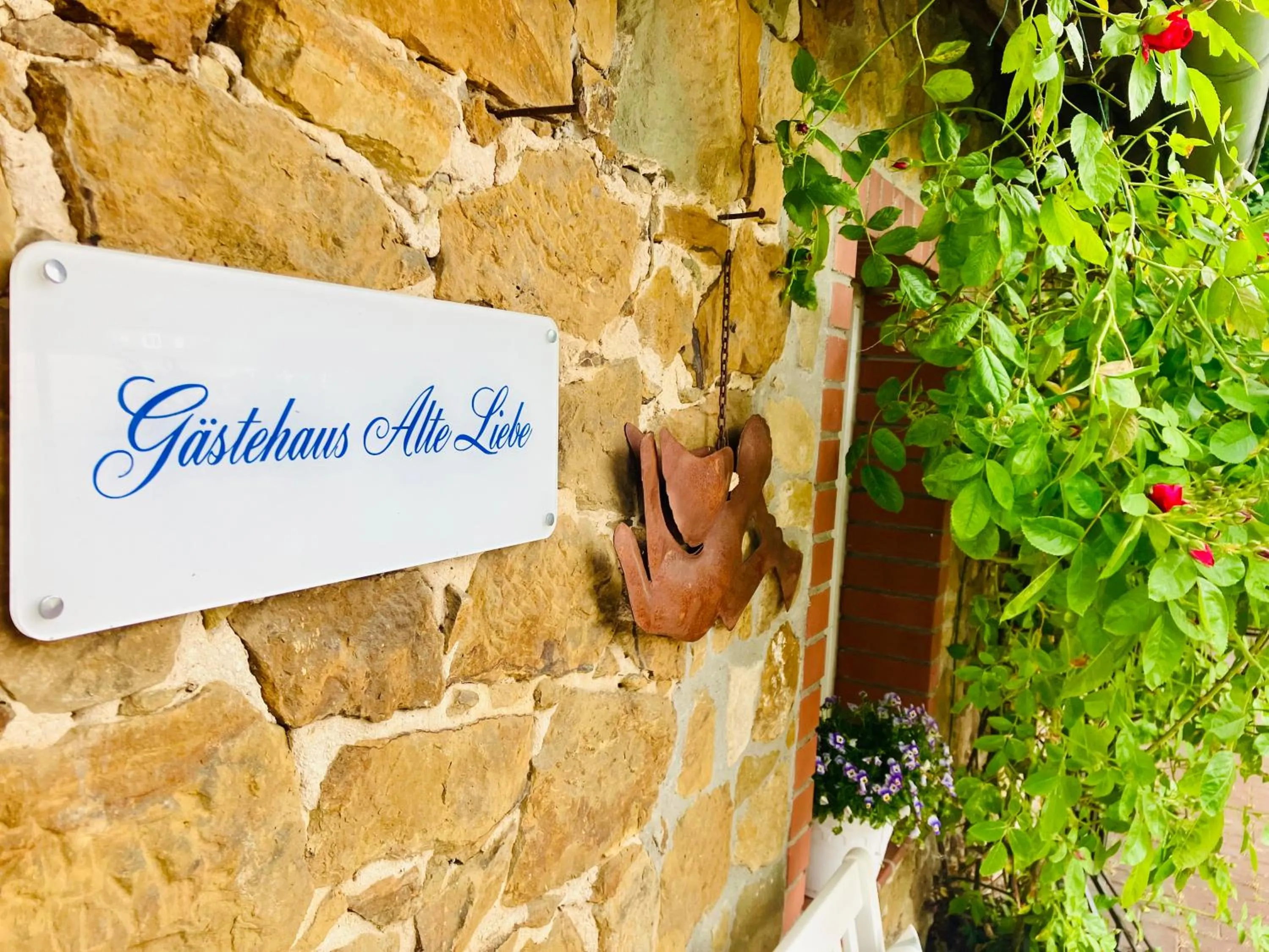 Property logo or sign in Gästehaus Alte Liebe