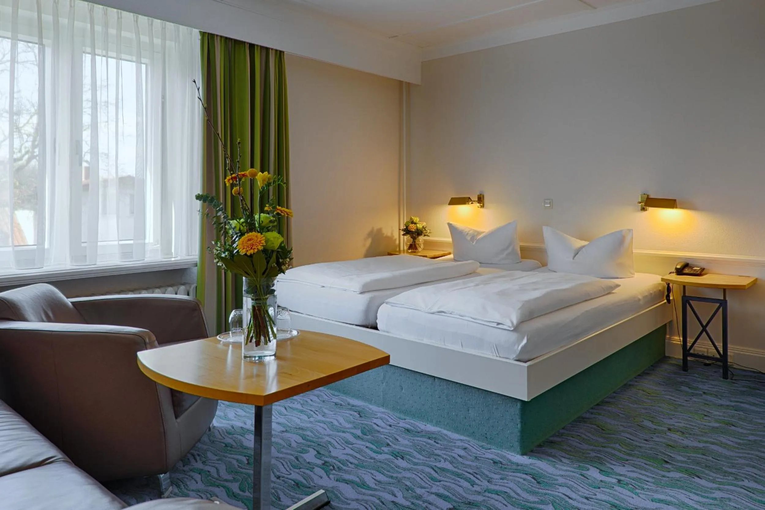 Photo of the whole room, Bed in Meeressterne Hotel Residenz in Heringsdorf
