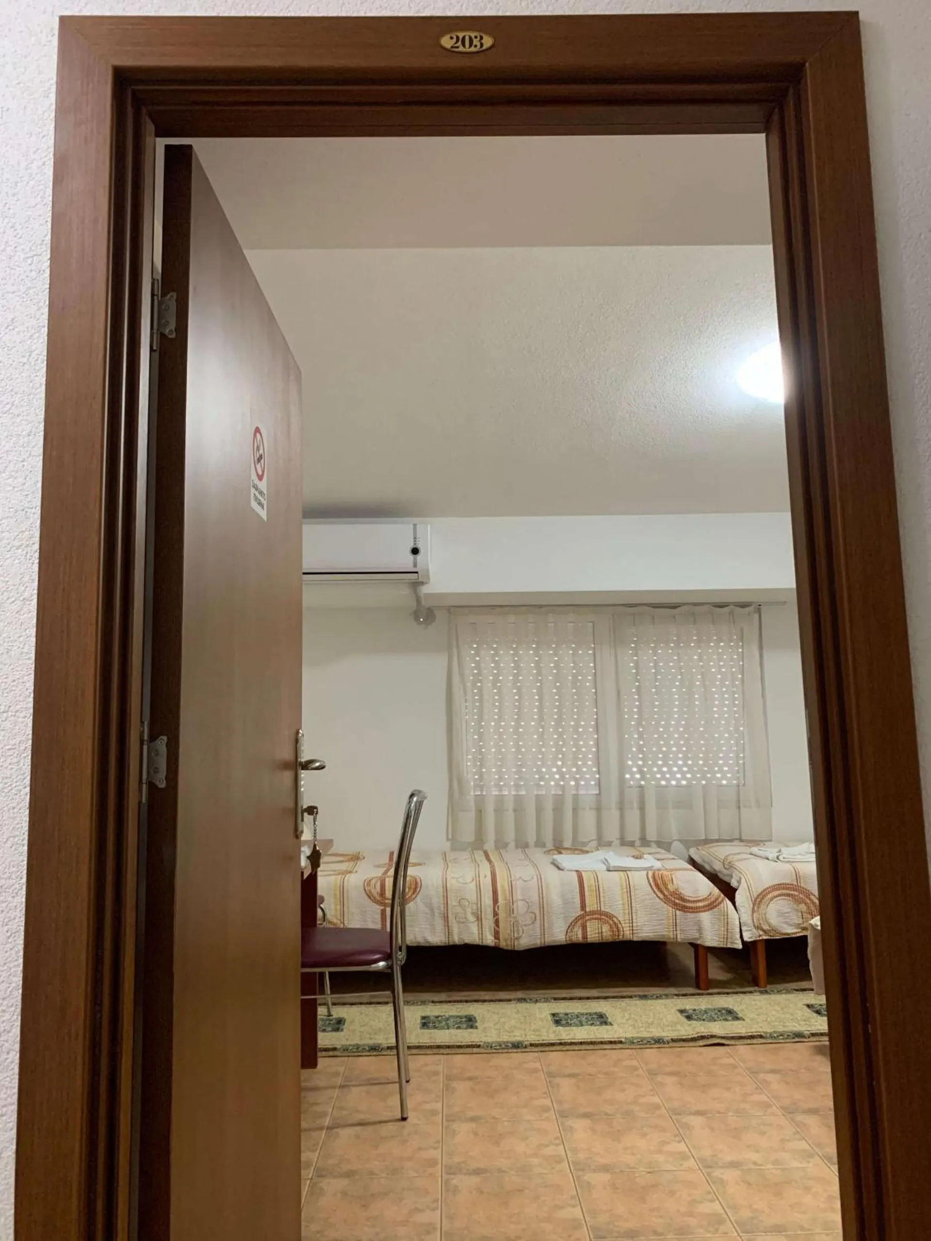 Bed in Royal L Hotel