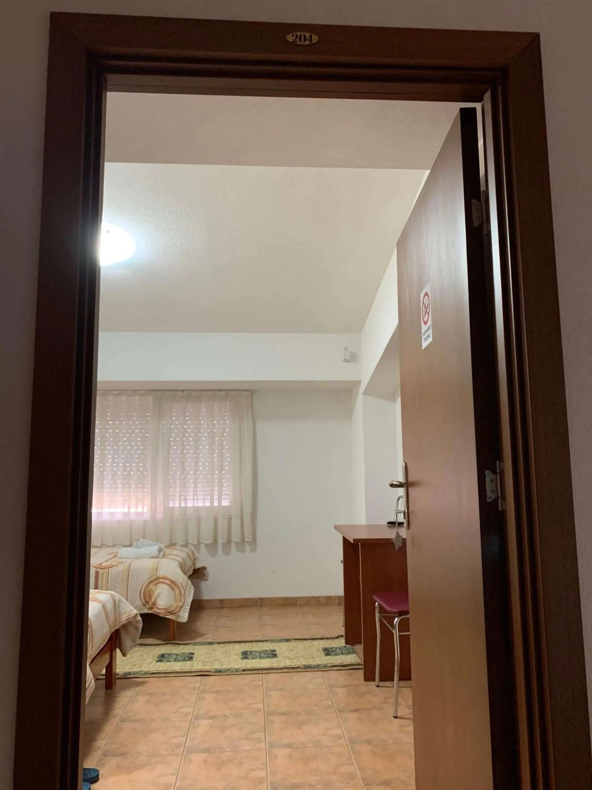 Bed in Royal L Hotel